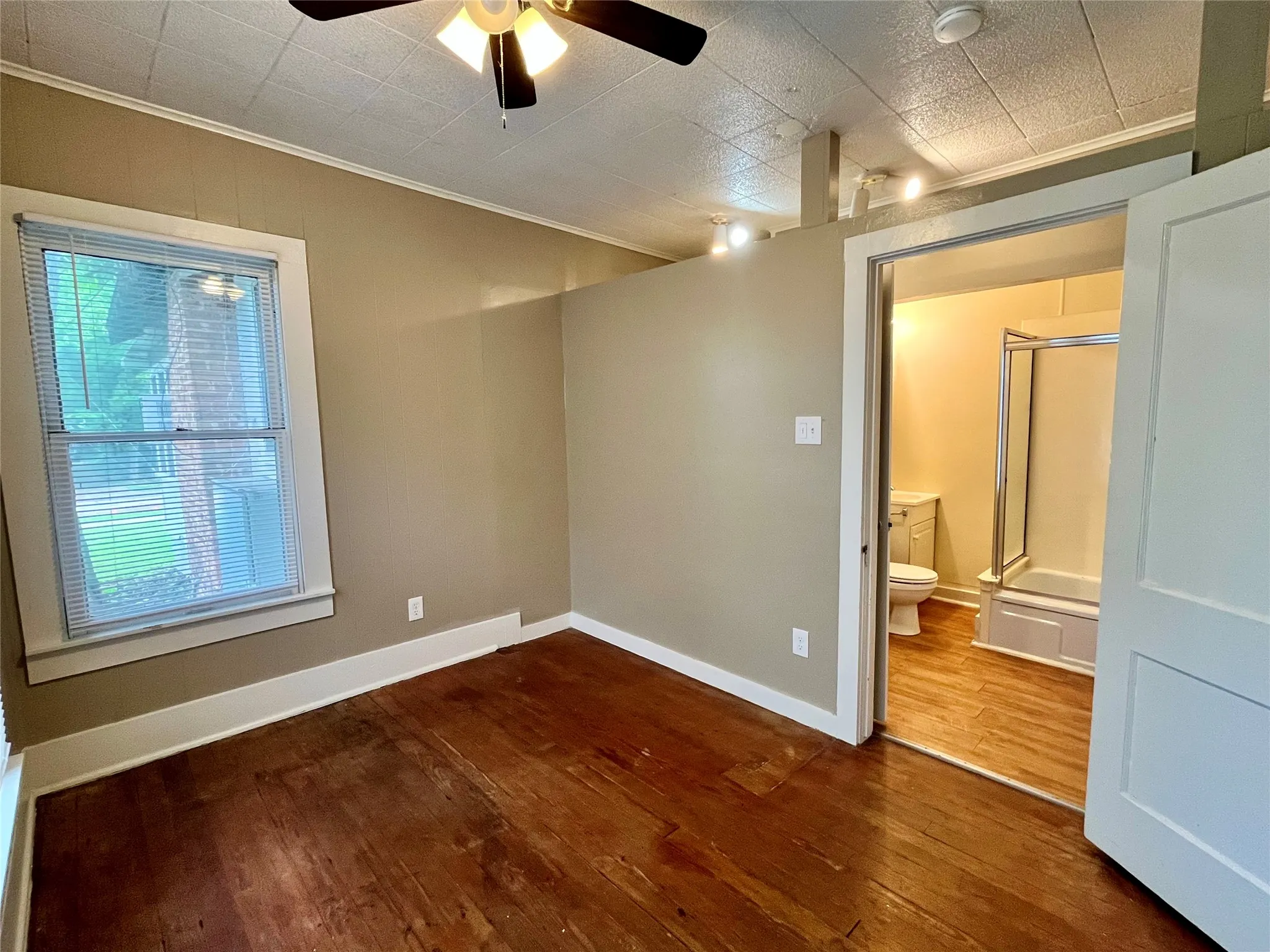 This cozy, private bedroom offers a peaceful layout with direct, convenient access to your en-suite bathroom.