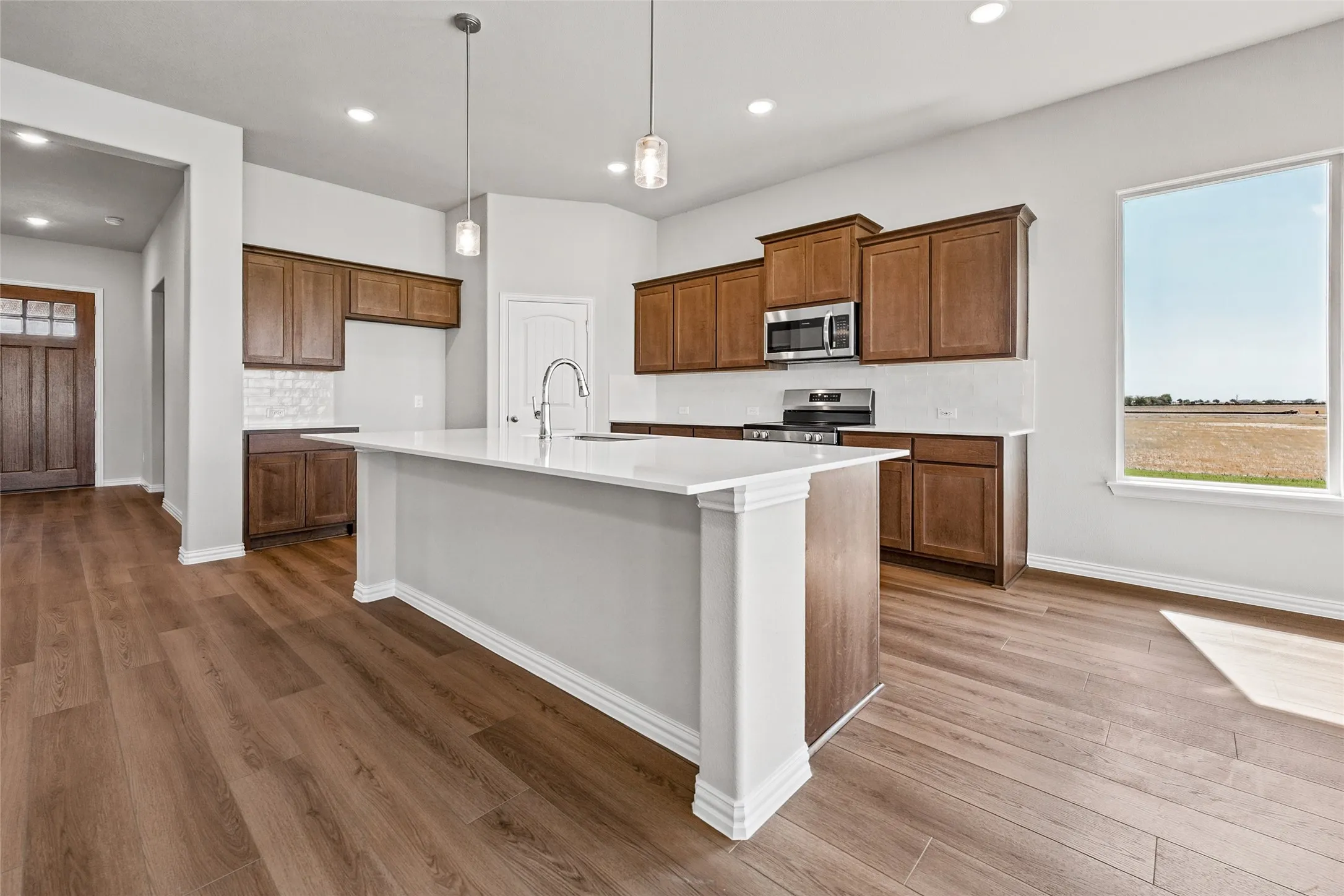 Expansive kitchen island with a white countertop