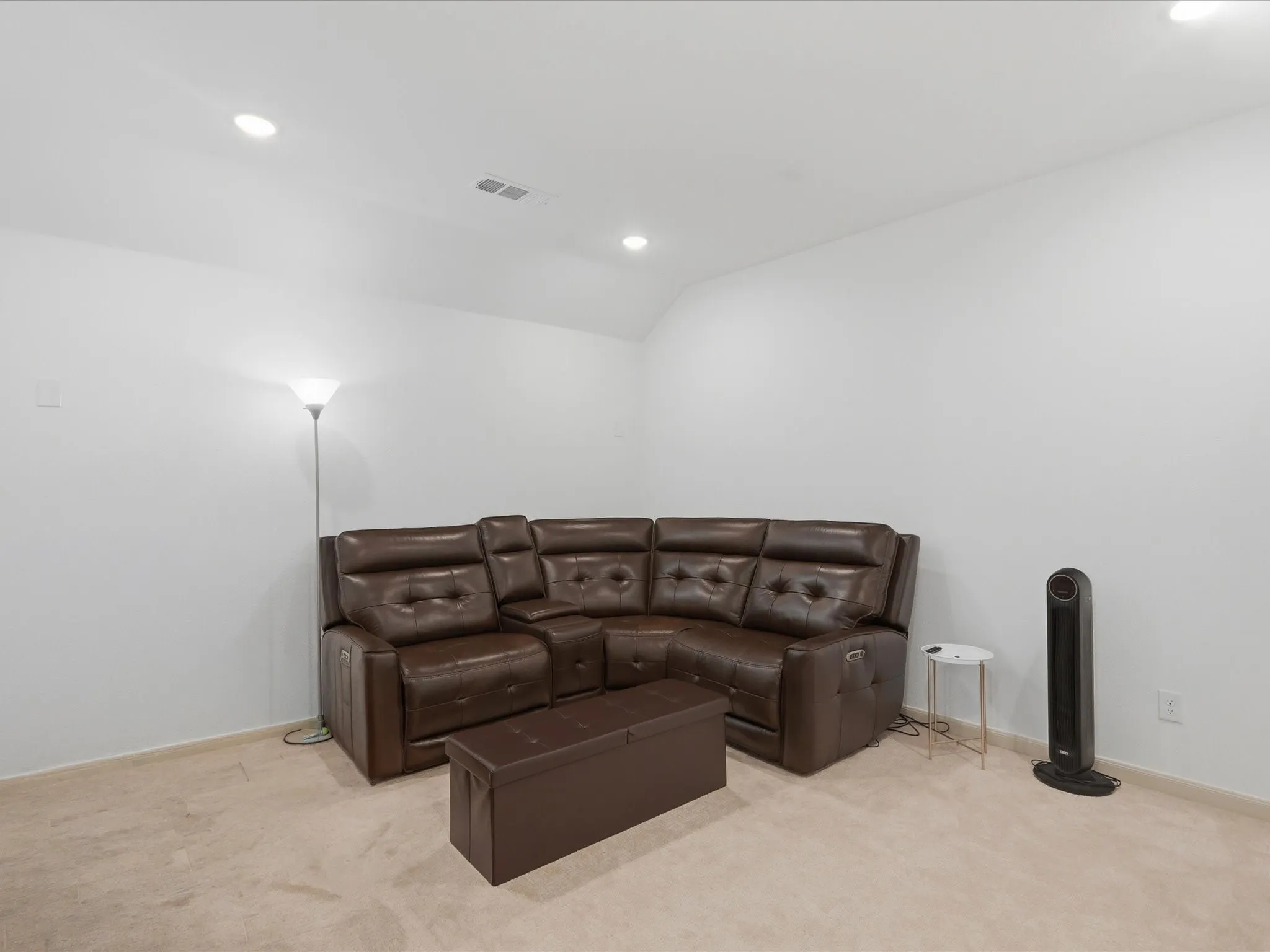 Carpeted room featuring recessed lighting and white walls