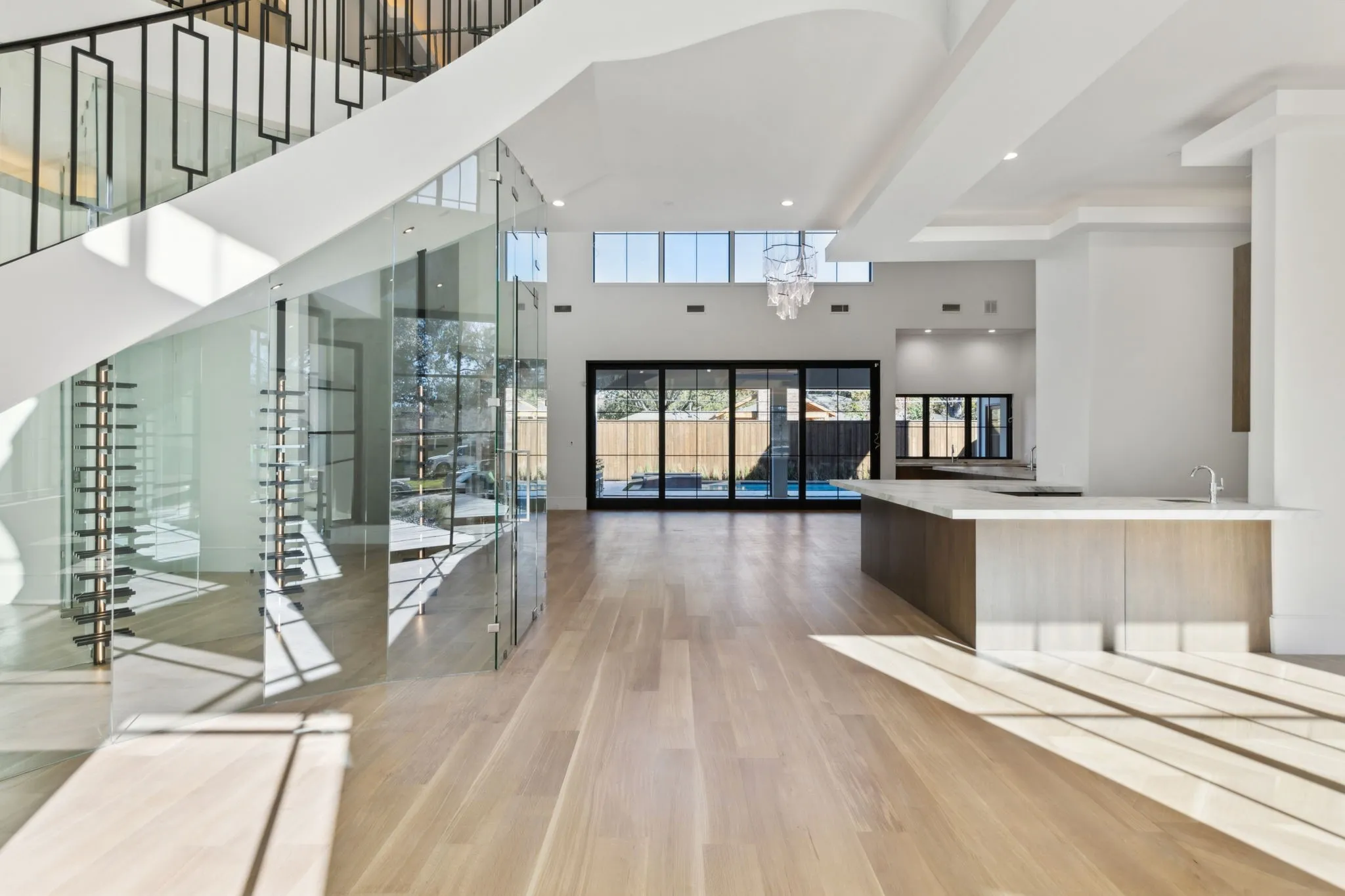 Lobby with recessed lighting and a towering ceiling