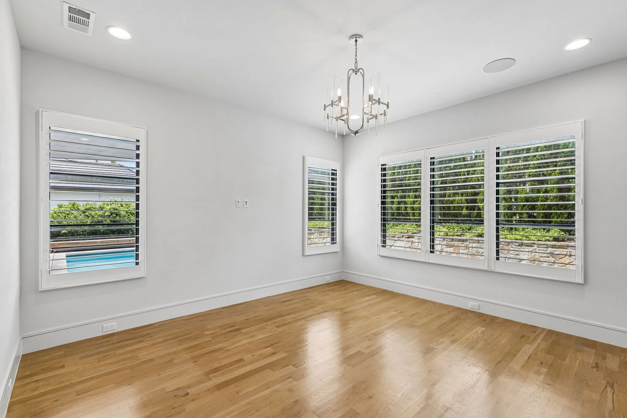 Primary bedroom overlooks the pool so you can keep an eye on older children