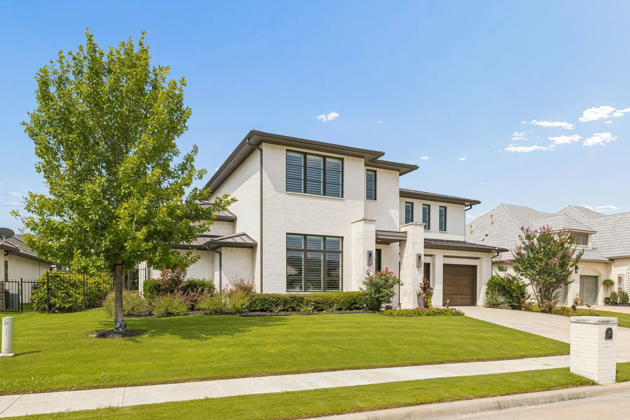 Green grass compliments the modern architectural design