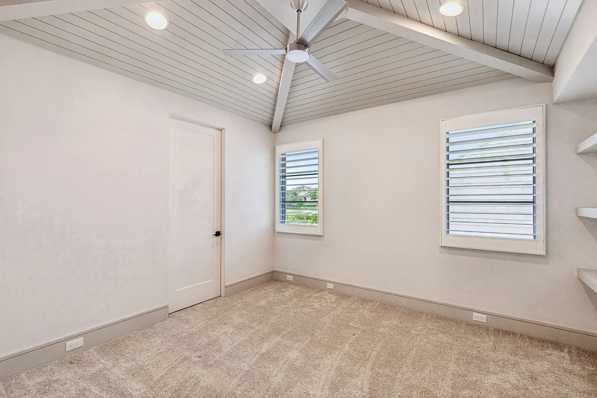 Bedroom overlooking the pool - bedroom two