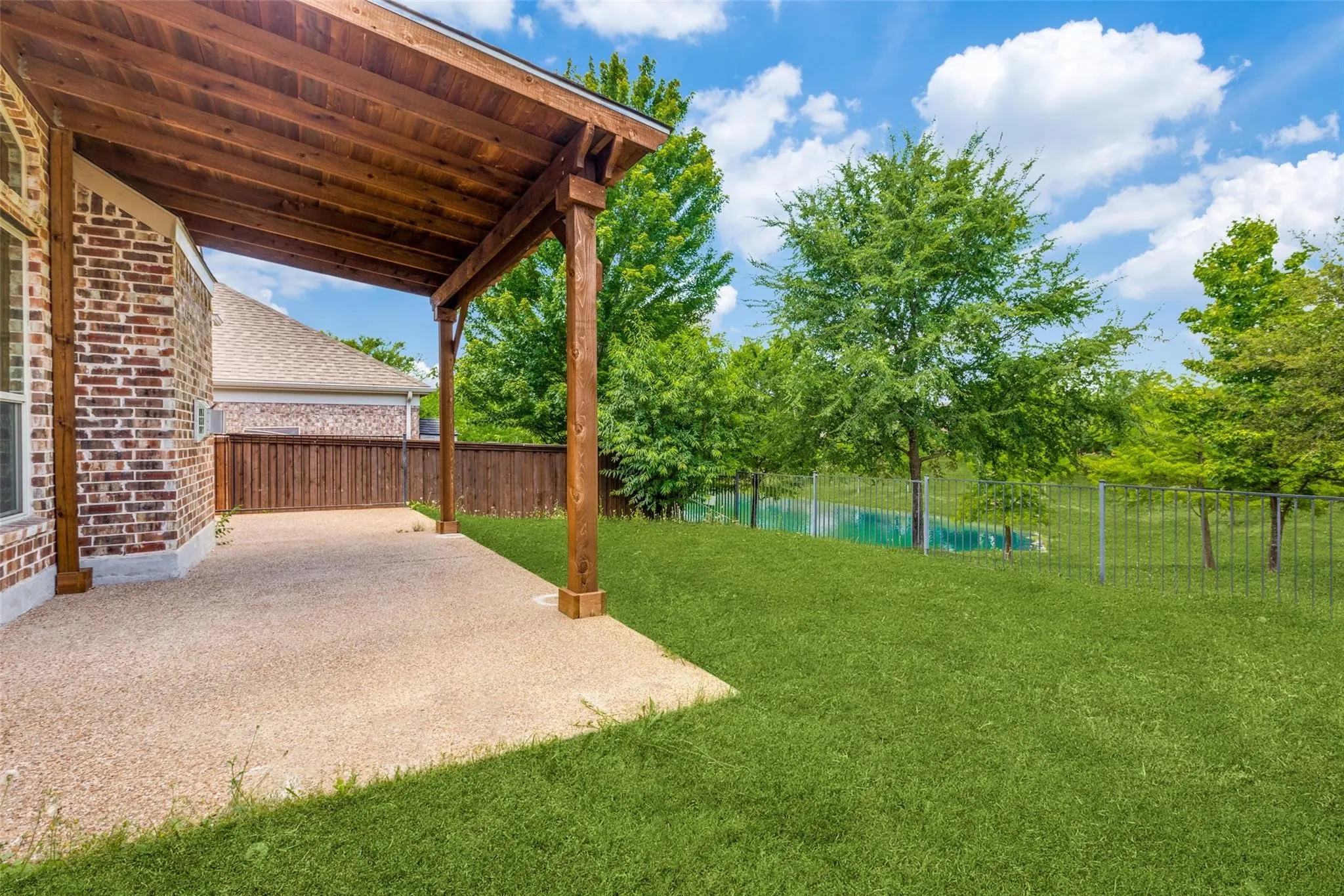 Covered patio with exposed aggregate flooring