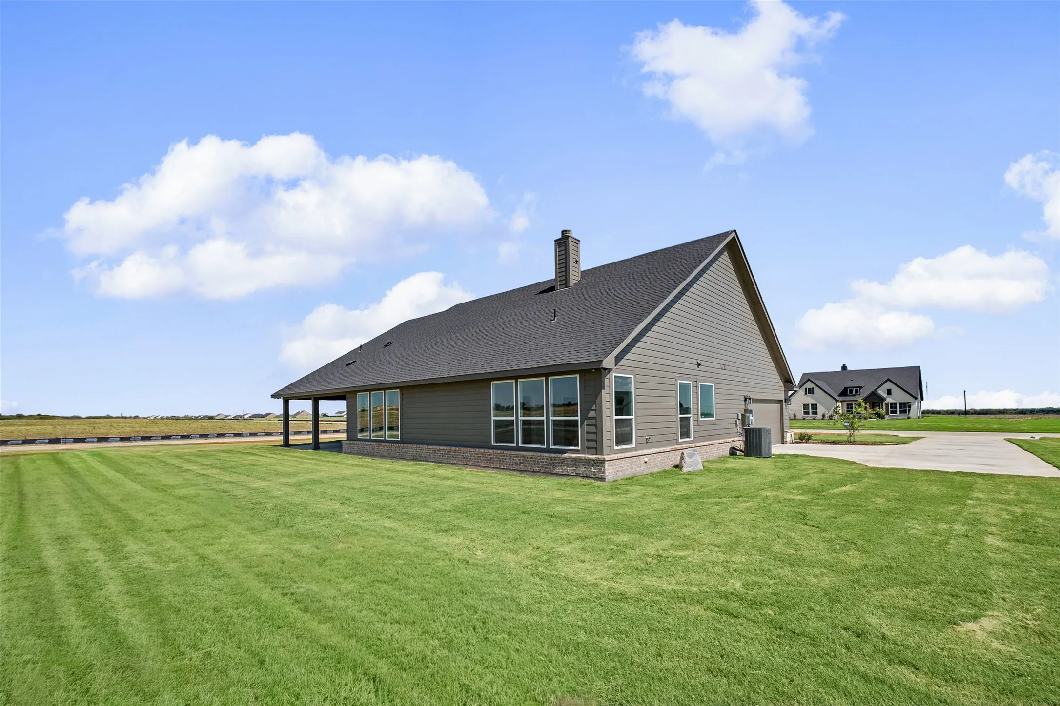 Expansive lawn surrounding the property