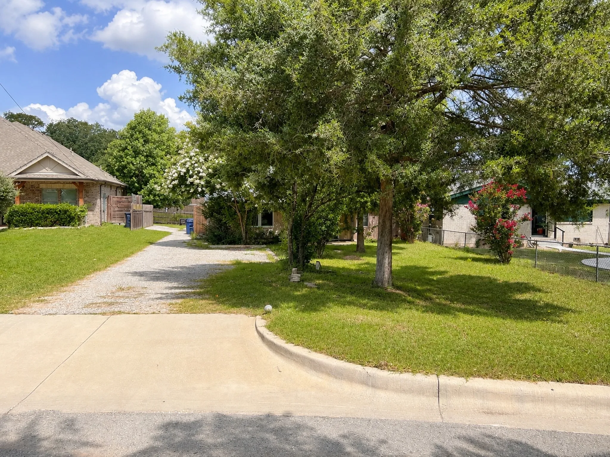 Newer homes on both sides of property