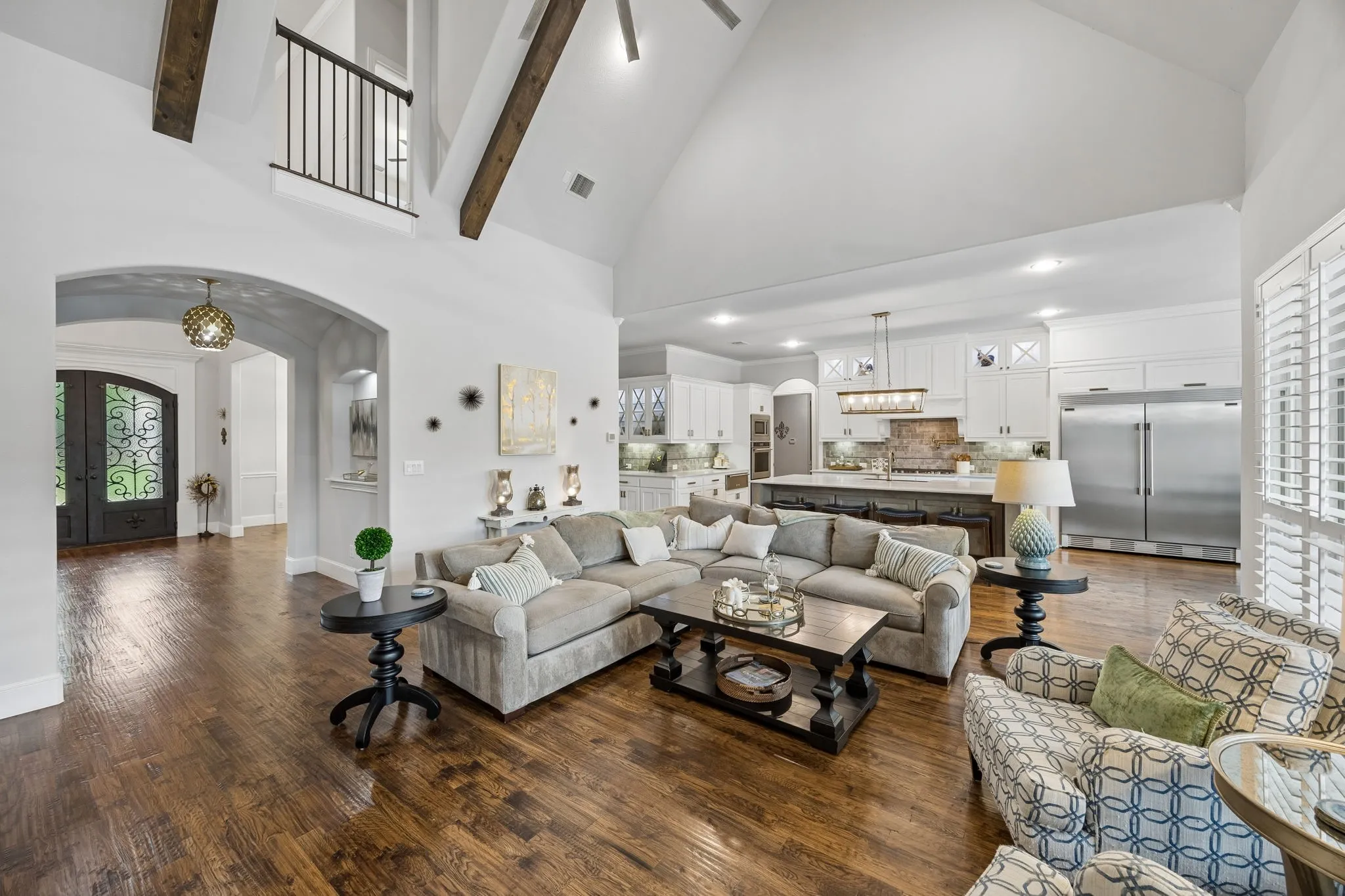 Spacious open living with 2 story cathedral ceiling and open to upstairs landing,