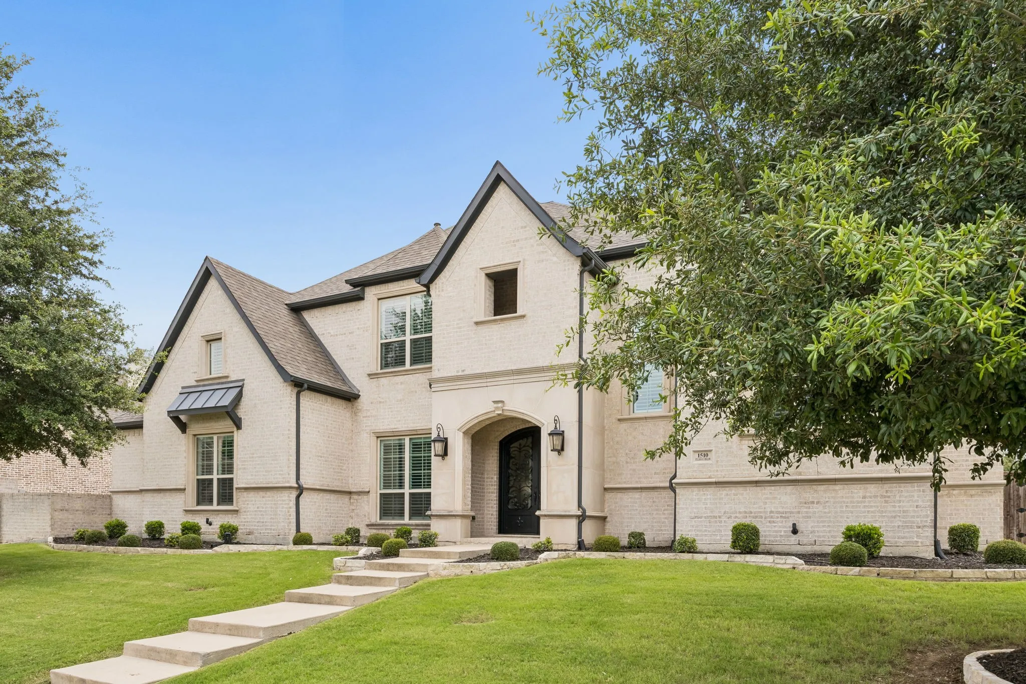Custom Iron Double Doors invite the most discerning buyer to this 5 bedroom home.  Sited on .38 acre North Facing lot in highly ranked Prosper ISD.  No MUD or PID on this beauty.