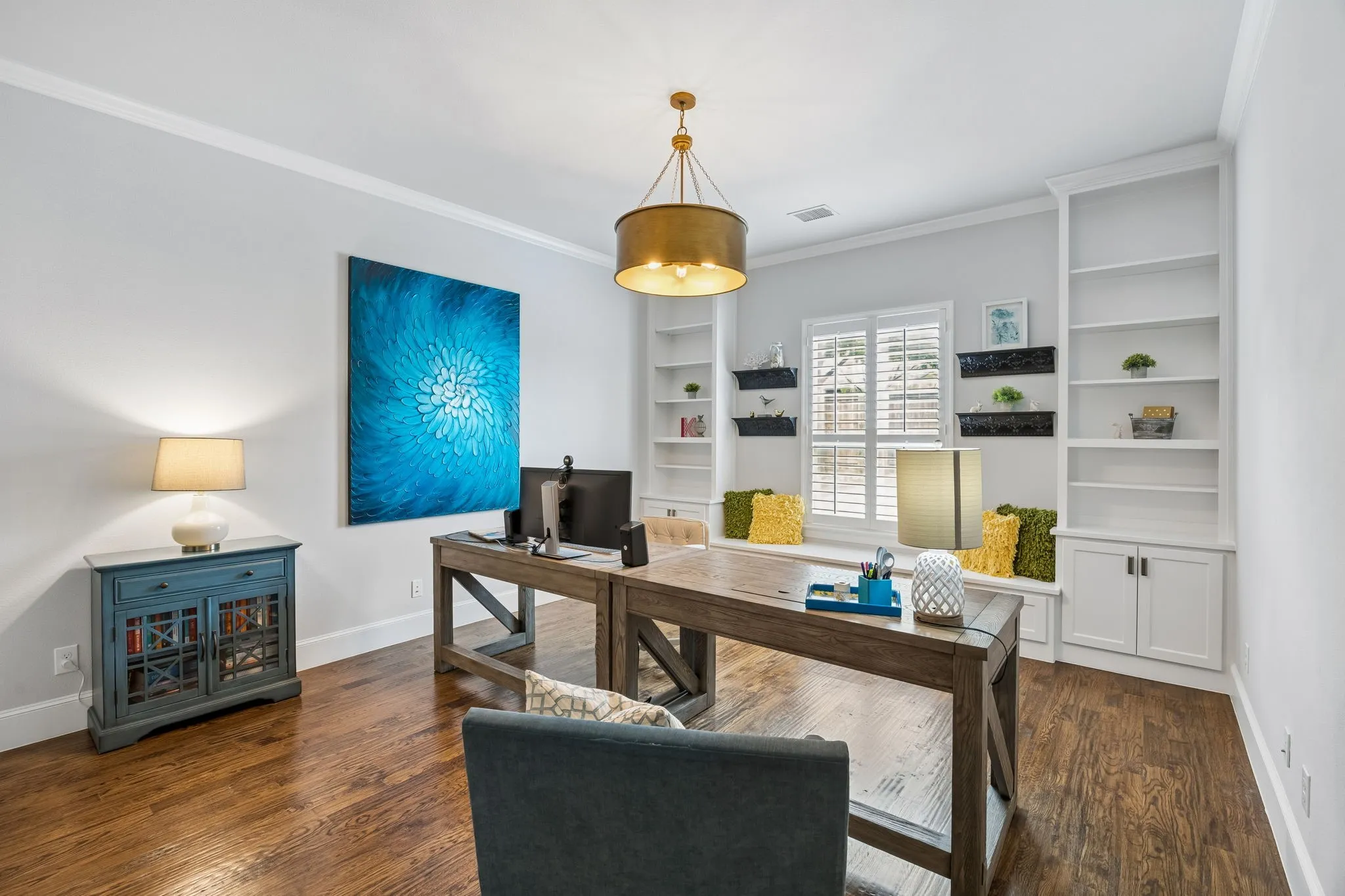 Mother-In-Law or guest bedroom downstairs with built-ins and Ensuite Bath.  Owner currently using as a second study.  This room is located in back of house, opposite side from Primary Bedroom.  Private and perfect for guests