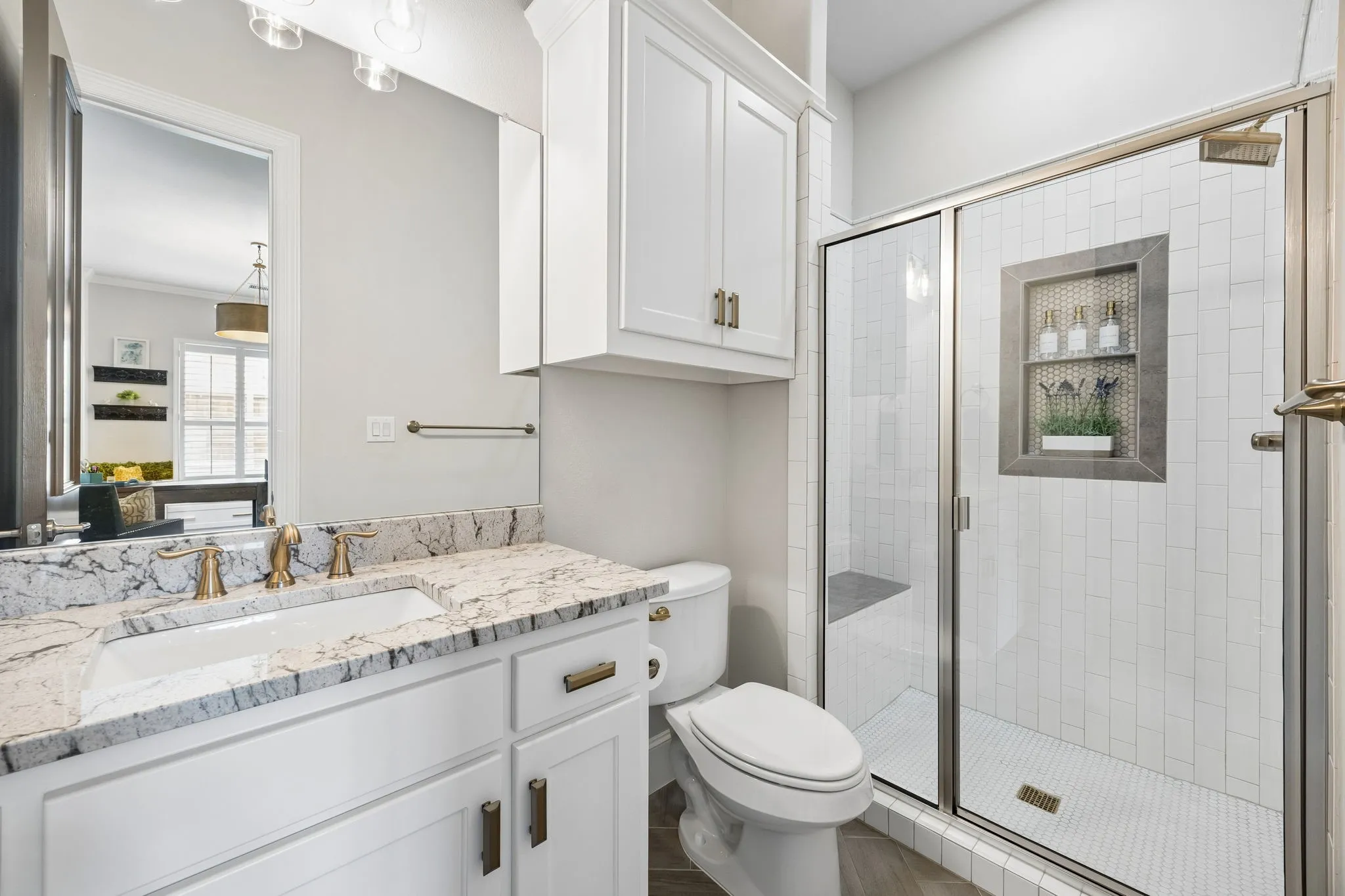 Downstairs Guest Bathroom with shower is attached to the Guest bedroom making this ideal for guests or a mother-in-law living arrangement.