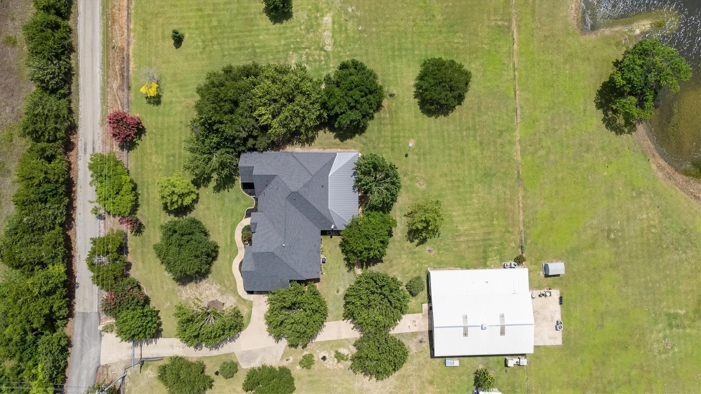 9 total acres. Could subdivide the 1 acre parcel with the existing slab