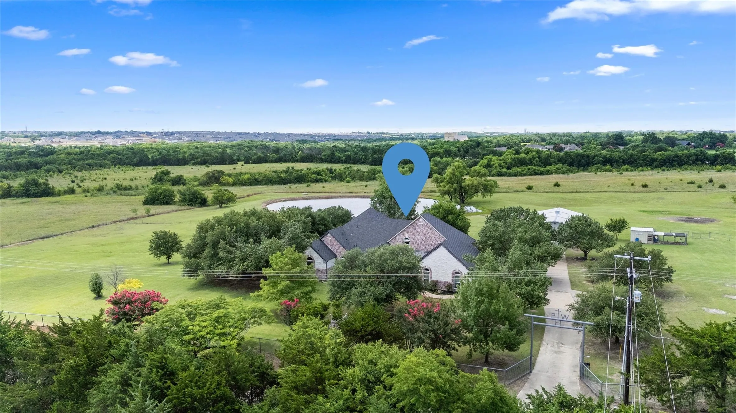 9 acres, main house, separte building under HVAC, pond and no neighbors behind. Acreage behind is in a flood plain and unlikely to be developed