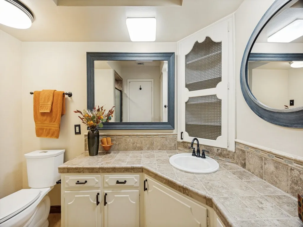 Plenty of storage, and space to get ready each day in this remodeled ensuite bathroom.
