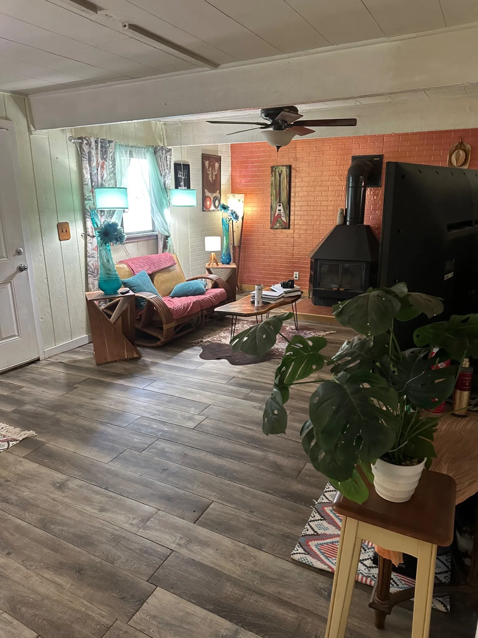 Interior space featuring wood-finish flooring and a ceiling fan