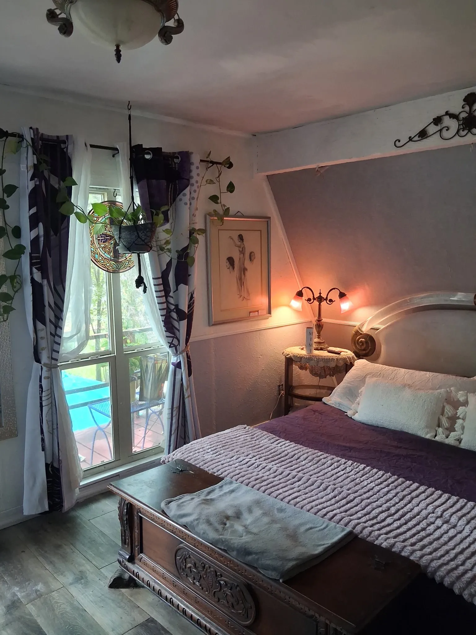 Wood-finish flooring, built-in window framing, and decorative wall molding