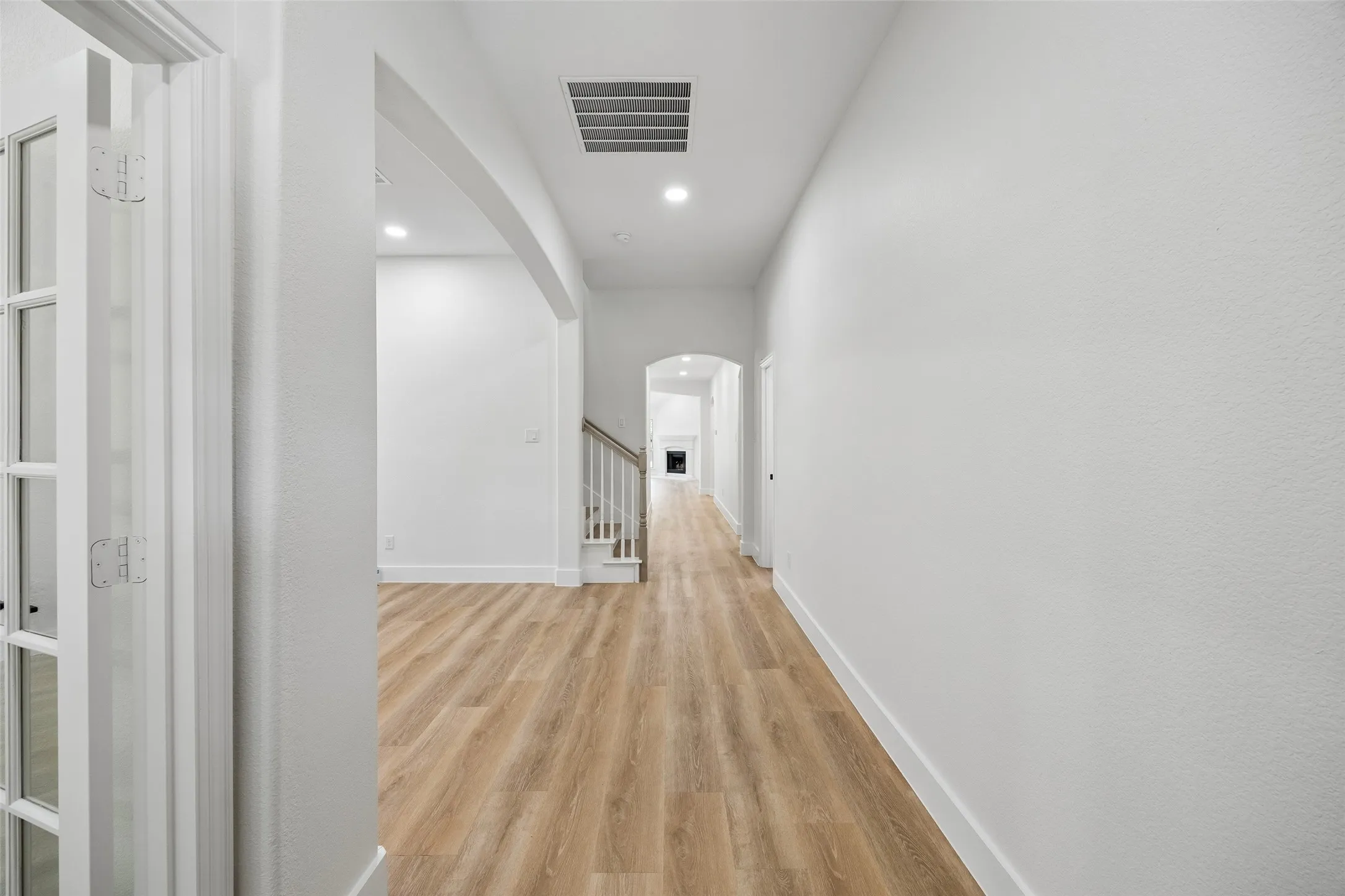 Entry, office and flex space that could be playroom, workout space, formal dining or formal living