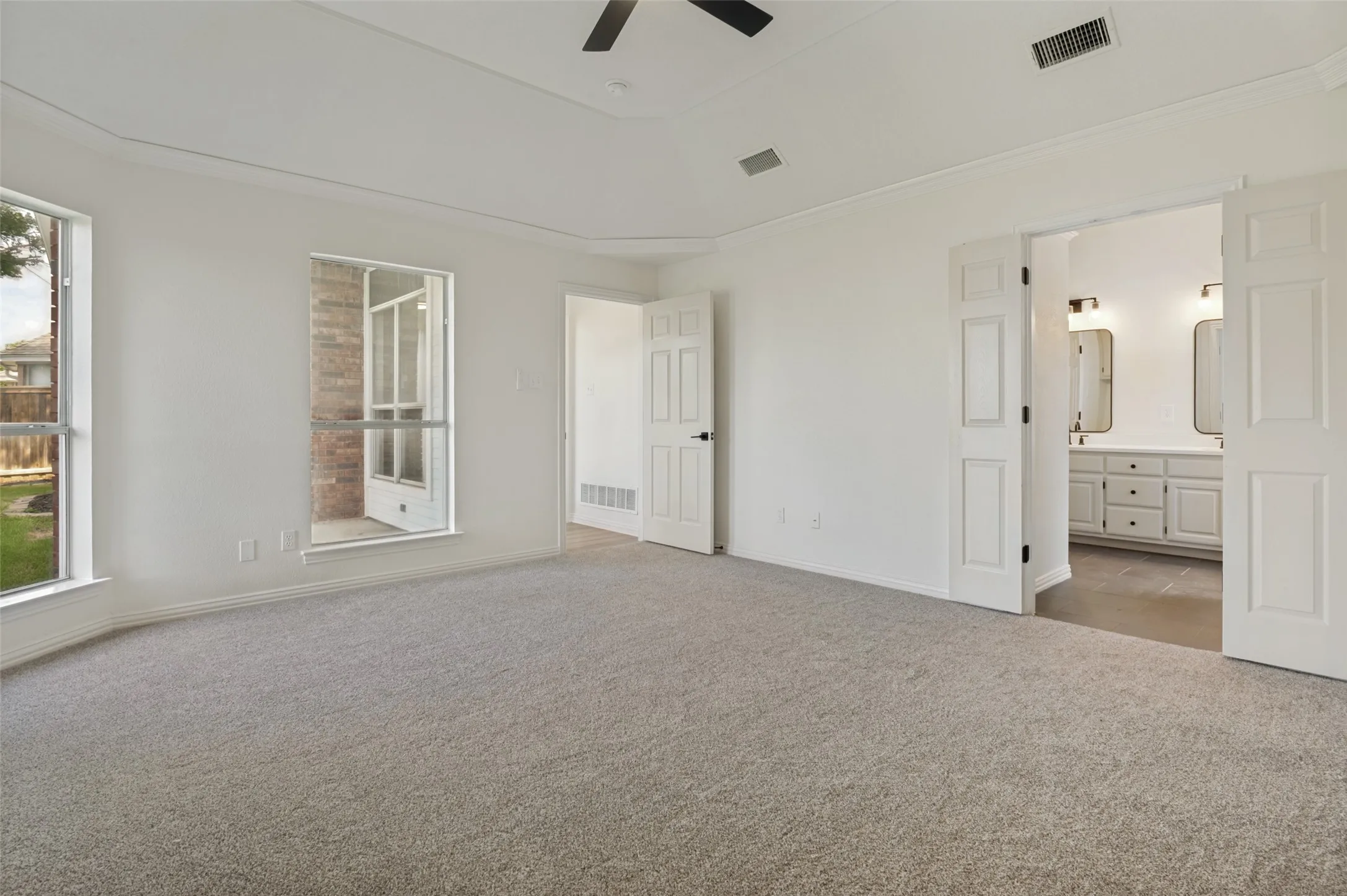 Neutral-toned carpeting throughout