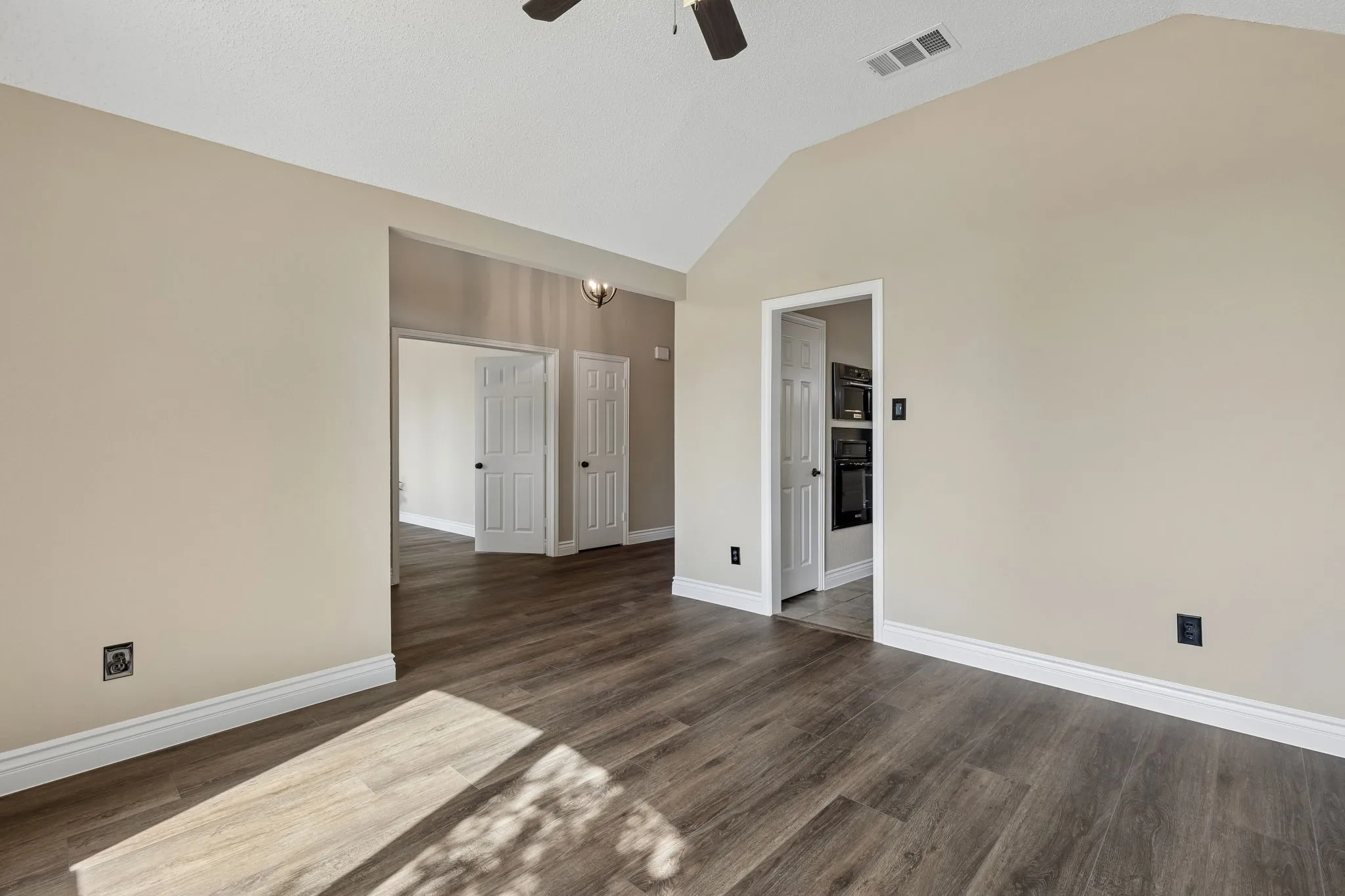 second view of dining or second living space. So fresh with updated paint and flooring!