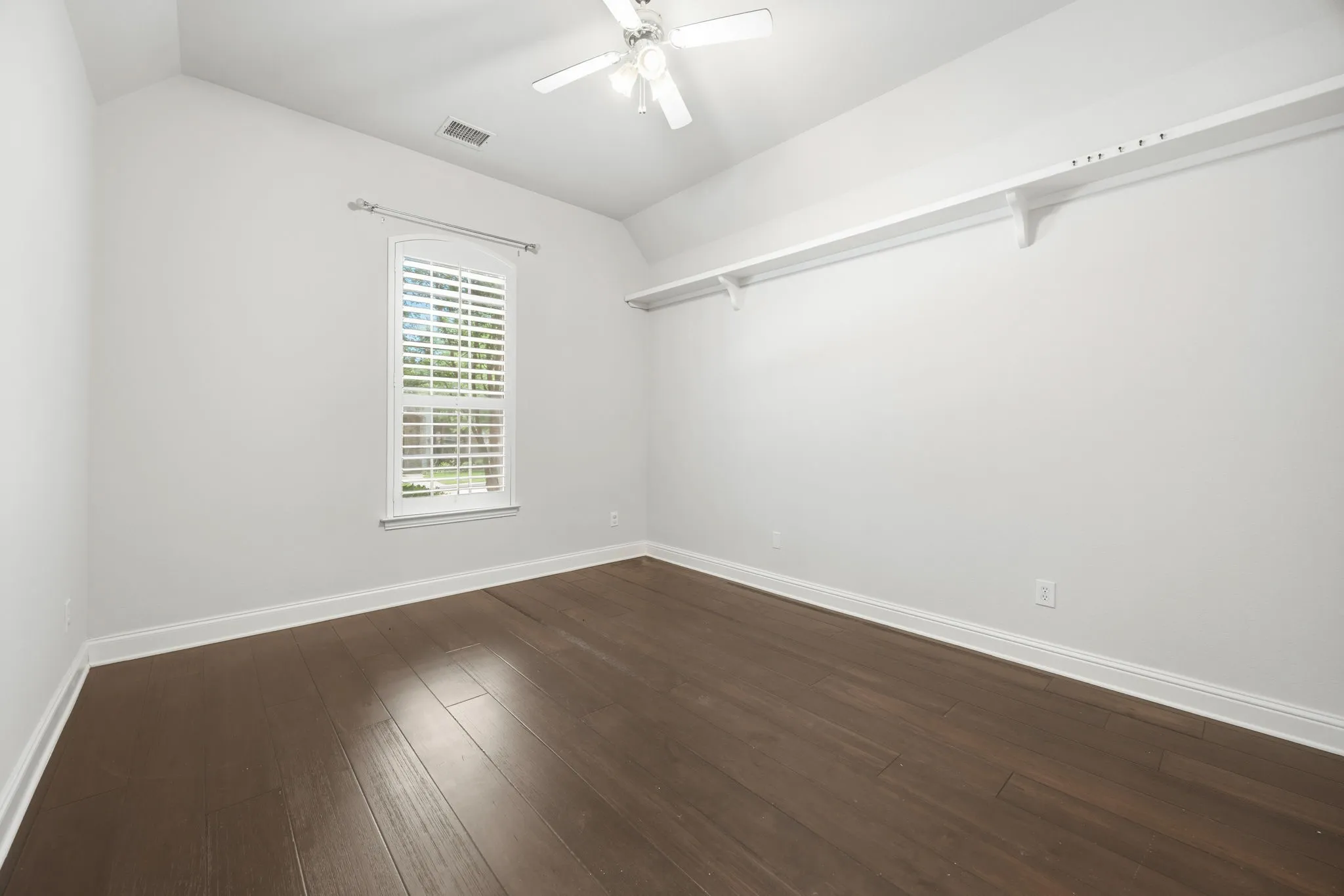 Bedroom # 3 downstairs with wood floors!