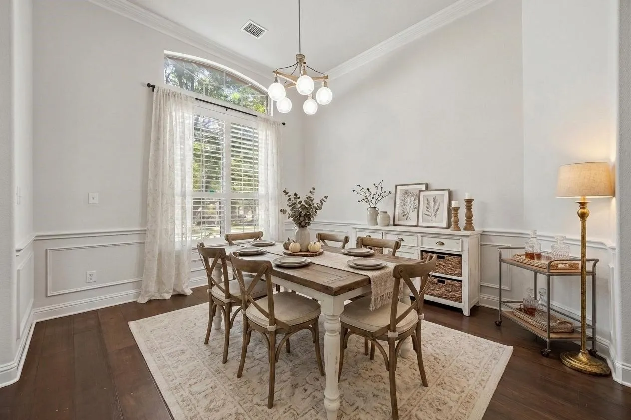 Formal Dining opens to kitchen for your sit down dinners! Virtually Staged
