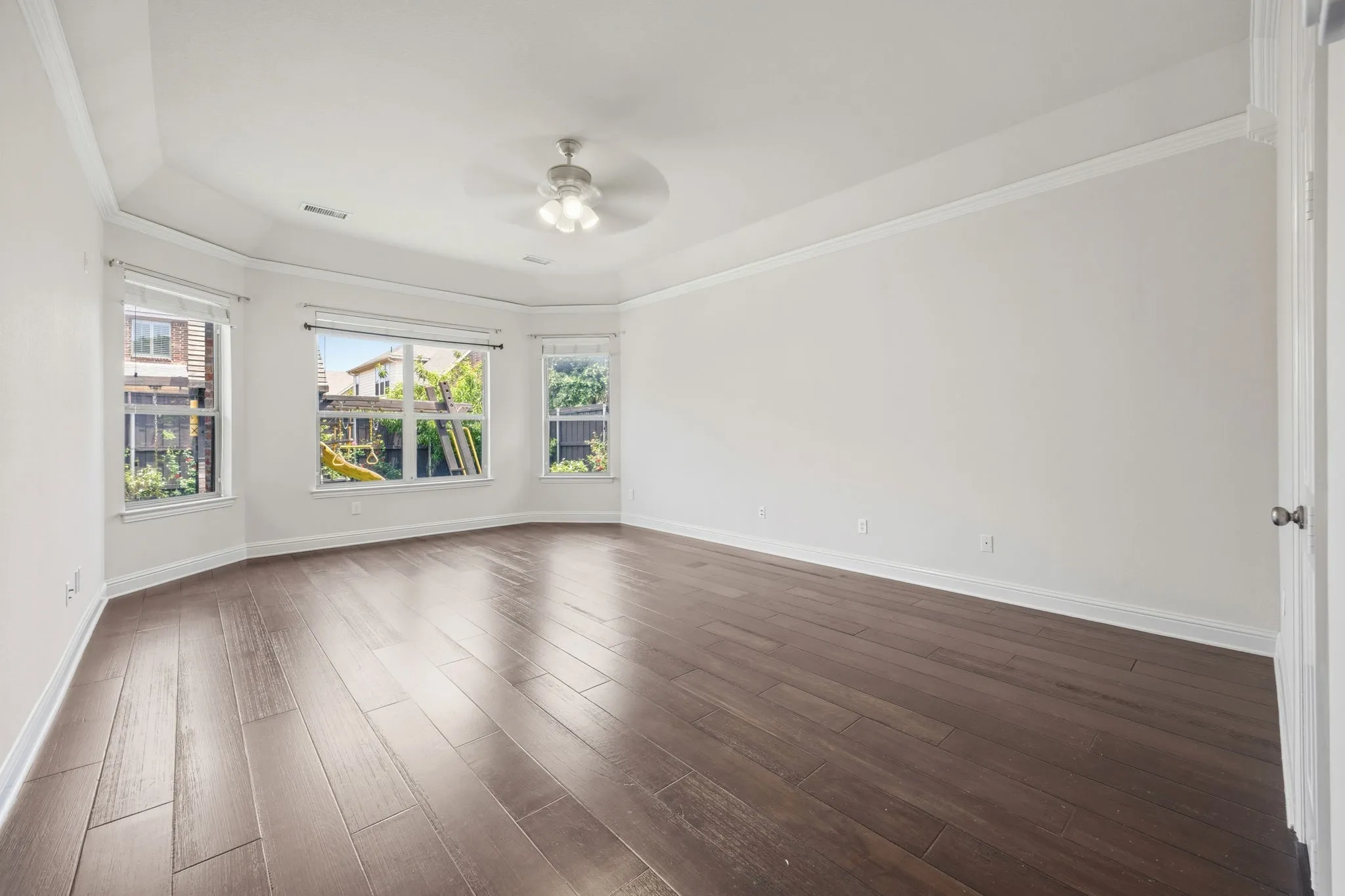 Spacious master Bedroom with so much natural light and bow windows