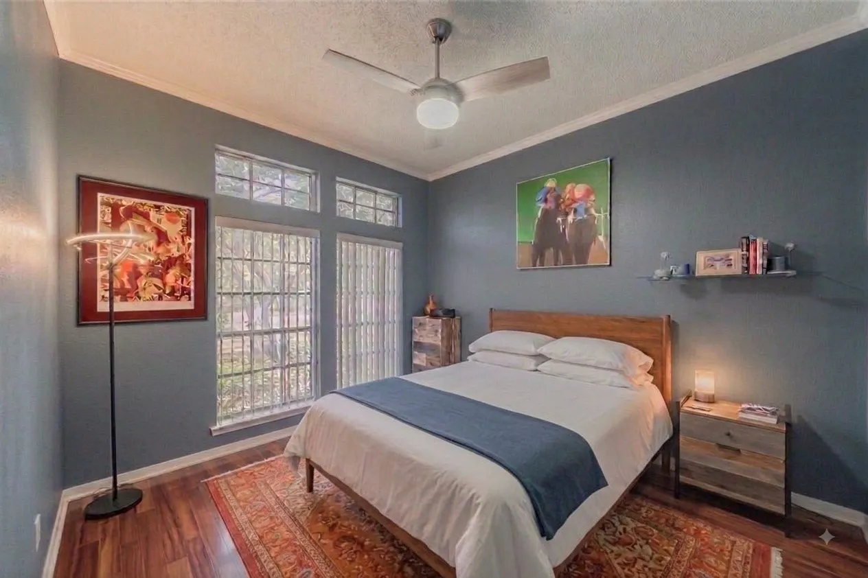 Enhanced with AI. Shows what the room will look like as a bedroom instead of an office.