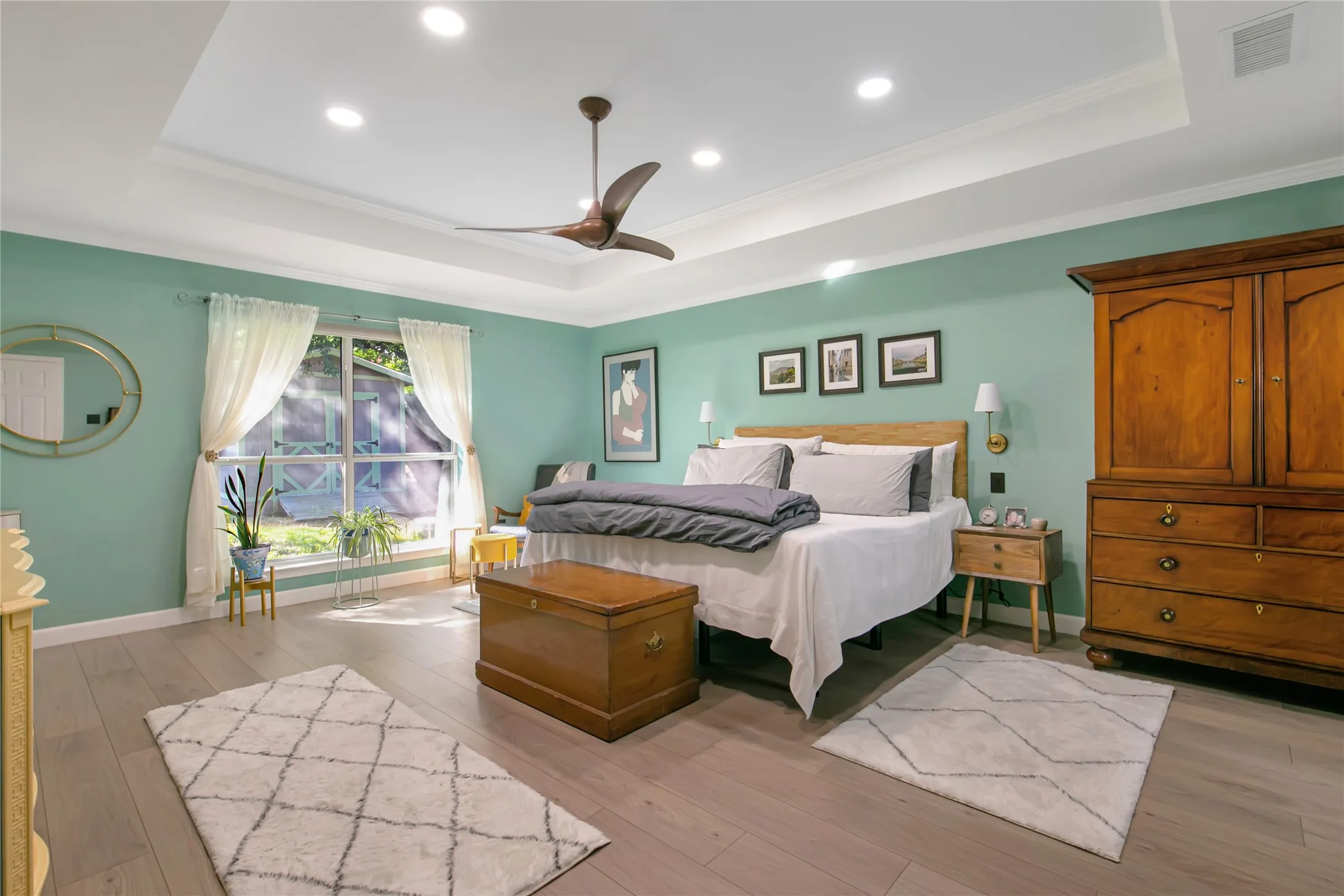 Wonderful oversized primary bedroom is a true retreat!  Overlooks the peaceful backyard.