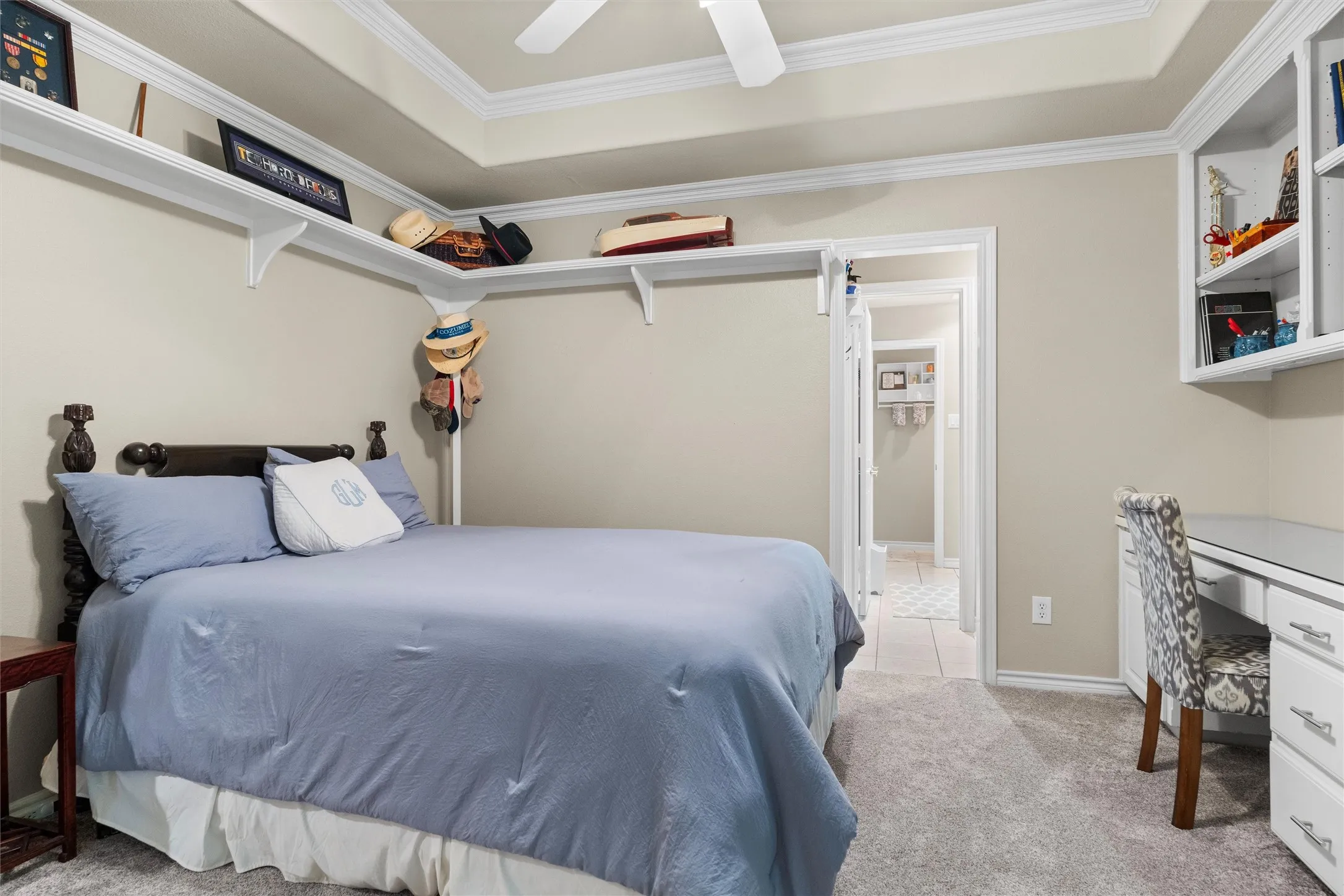 Cozy bedroom with workspace and adjacent Jack n Jill bathroom.