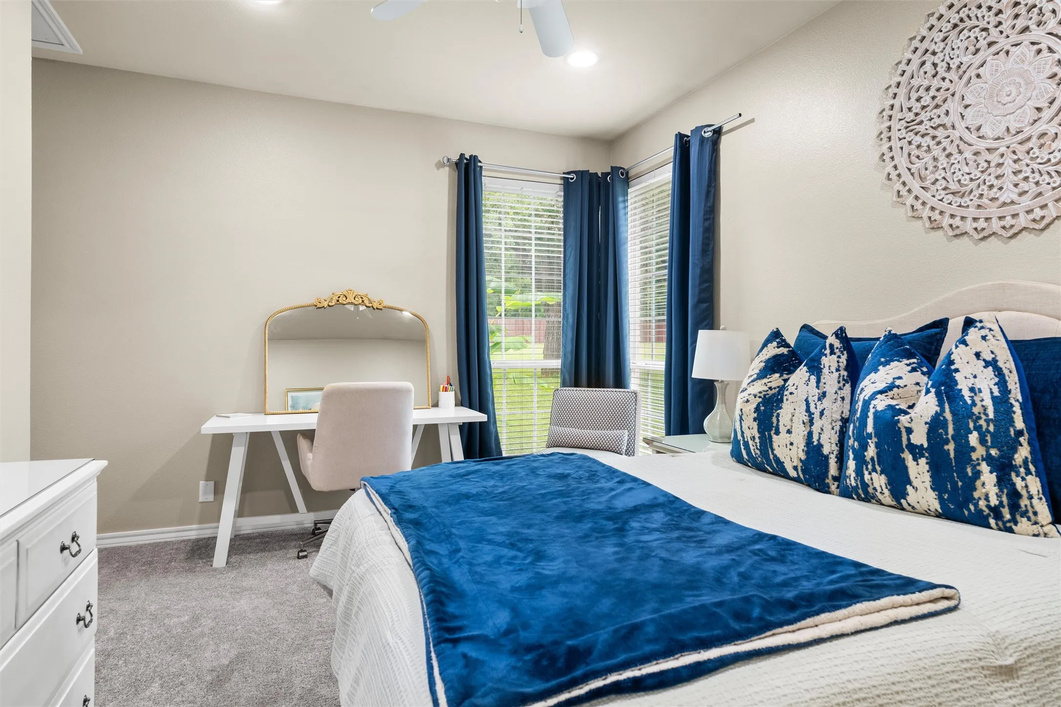 Carpeted bedroom featuring neutral paint, a ceiling fan with integrated lighting, window blinds, and recessed lighting