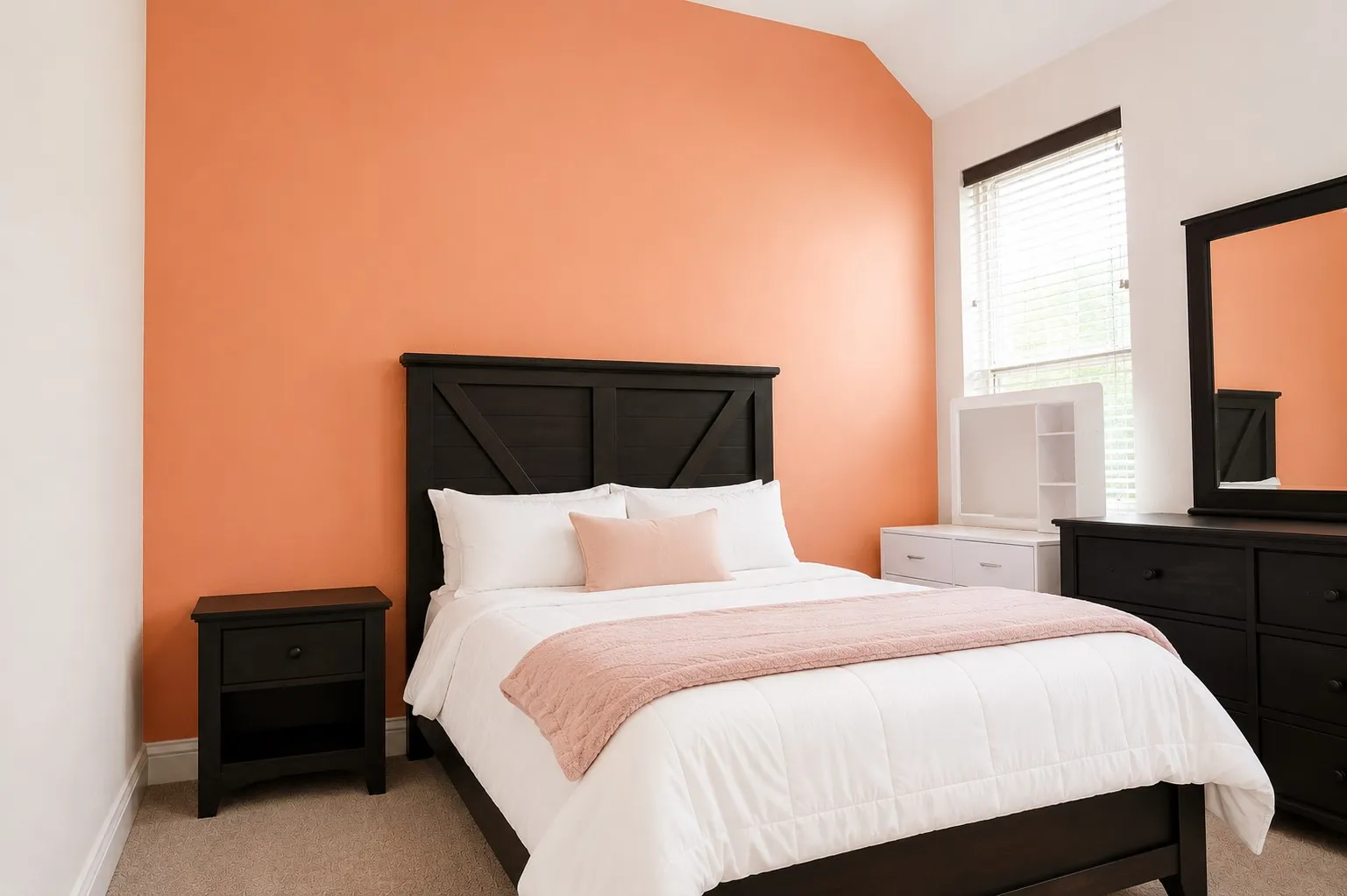 Room with vaulted ceiling, window with blinds, and neutral carpet flooring