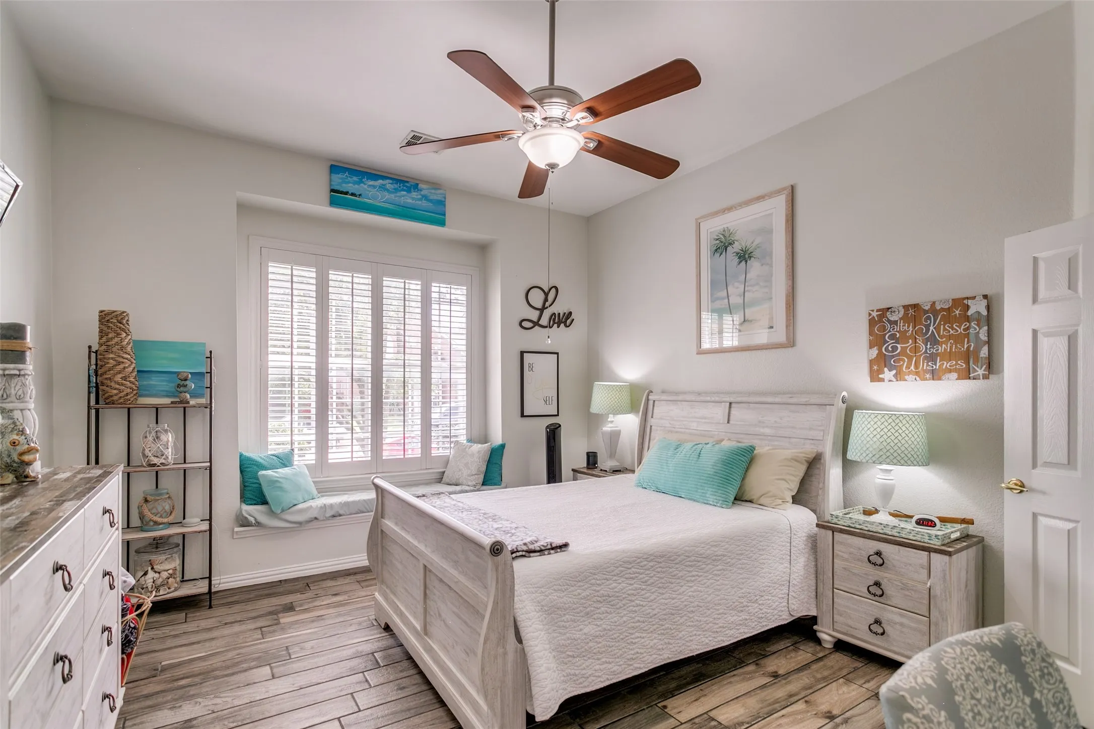 Lovely primary bedroom with window seating in the front of the home and plenty of room for your furniture.