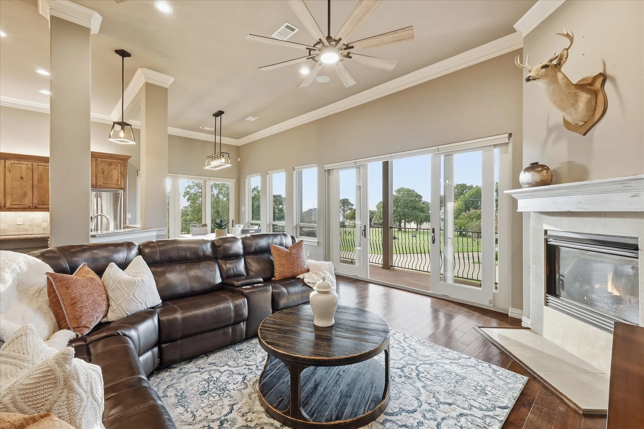 Notice the huge double sliding doors that lead to the 2nd story balcony! All of the windows have remote controlled electric blinds.