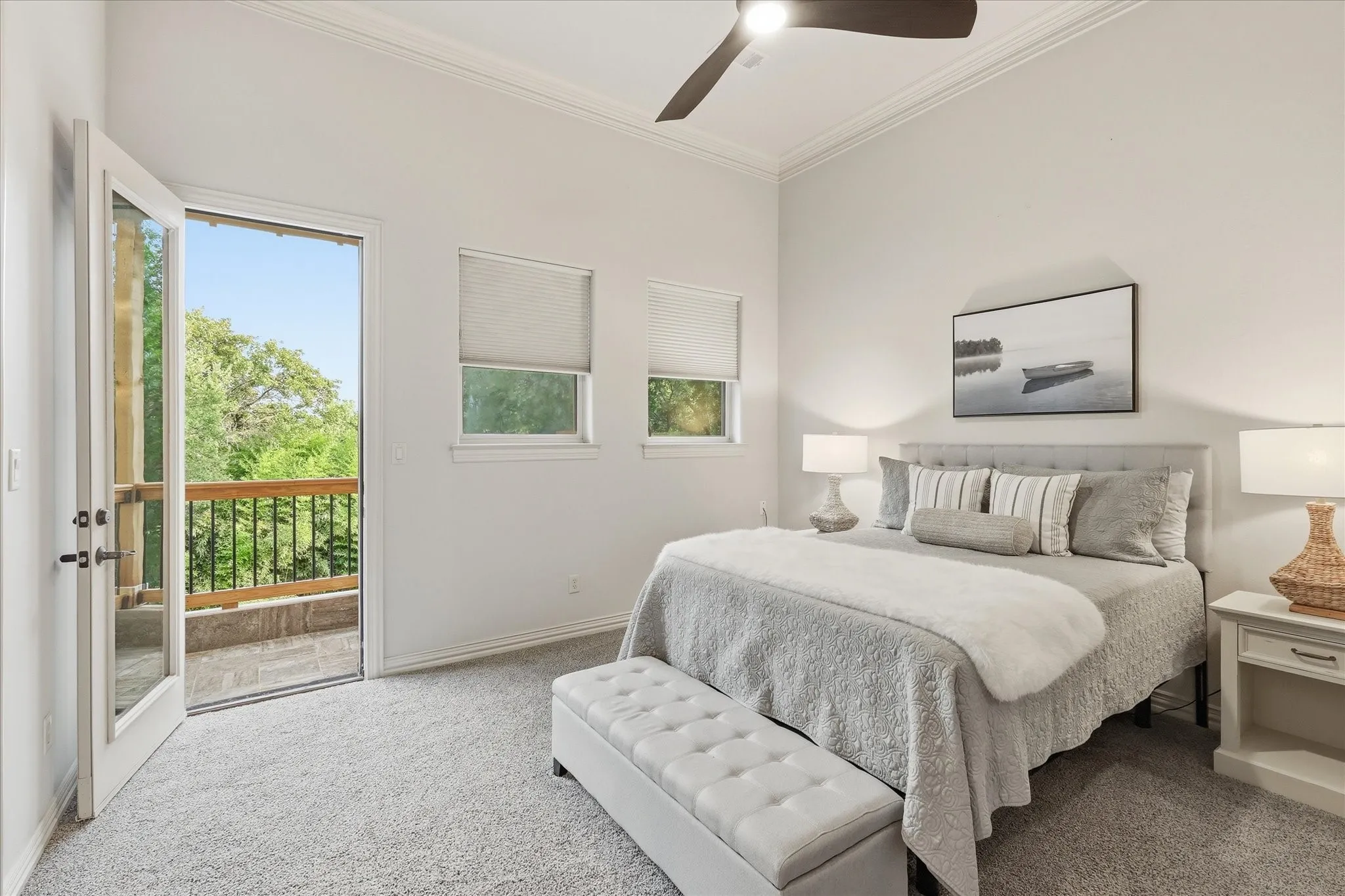 There is a bedroom on the 2nd floor with a private, covered patio overlooking the backyard. It also features a new fan, separate zoned thermostat, double crown molding and remote control electric blinds.