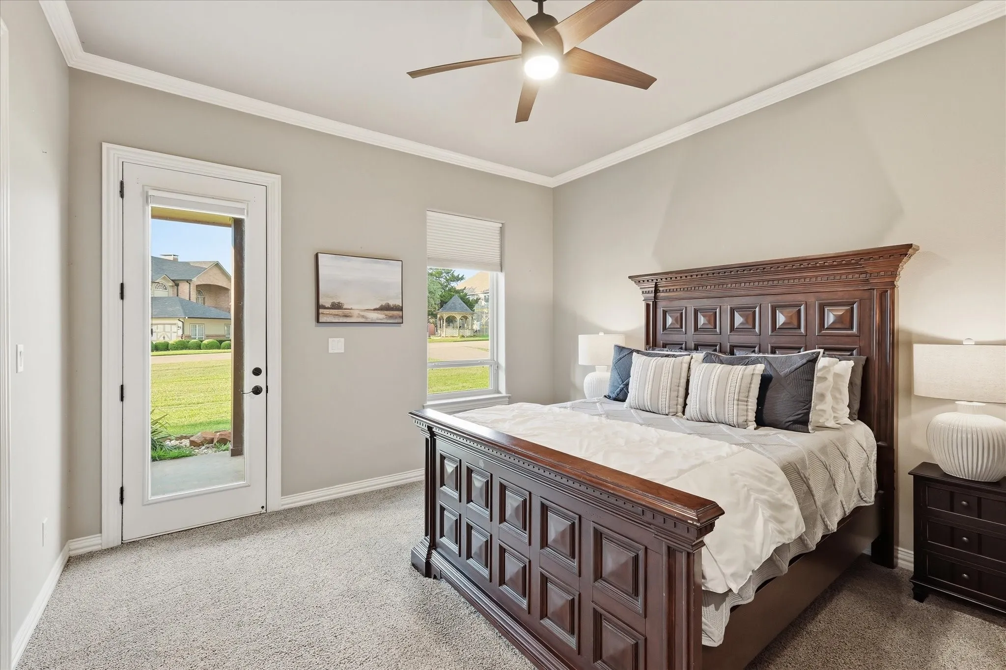 1st floor bedroom has a private door that accesses the front porch, double crown molding, new ceiling fan and 2 large walk in closets. It also has access to a Jack and Jill bathroom.