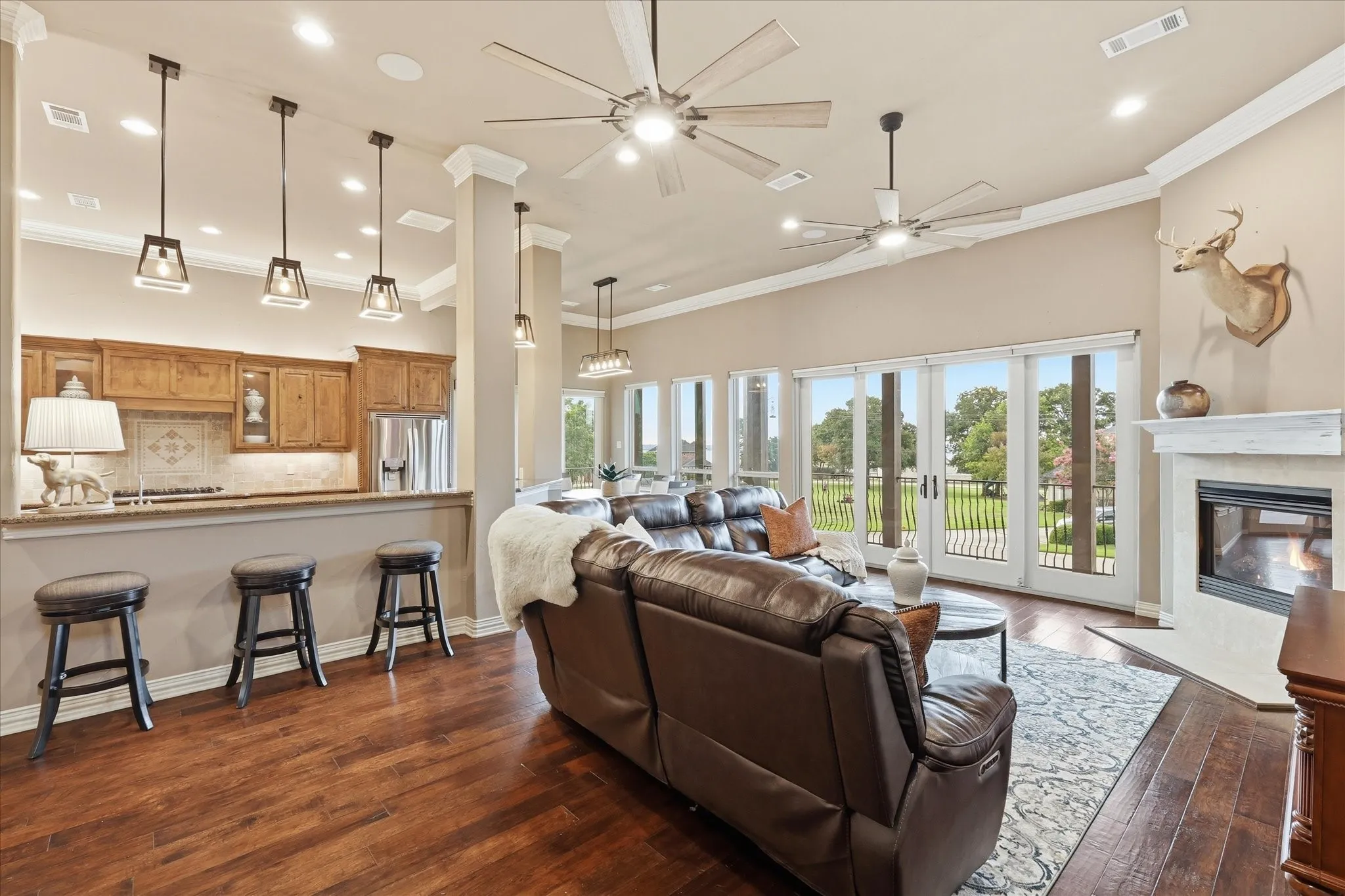 The main living area is open concept, light and bright. Enjoy cozy evenings in front of the gas fireplace, amazing movie nights with the built in surround sound speakers and gorgeous, low maintenance engineered wood floors. Enjoy a separate zoned thermostat!