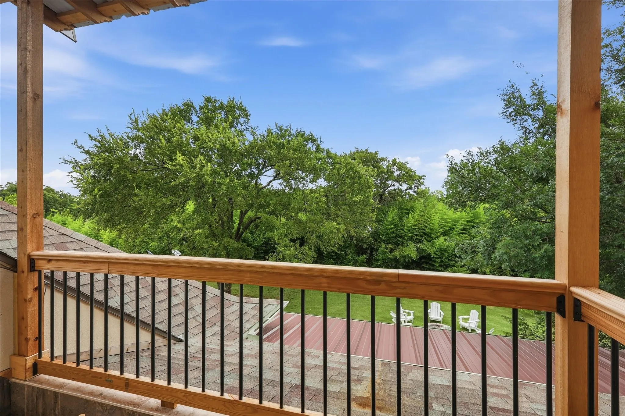 Enjoy your morning coffee with a relaxing view of the back yard from the 2nd floor bedroom's private balcony. The entire balcony was re-built in 2026.