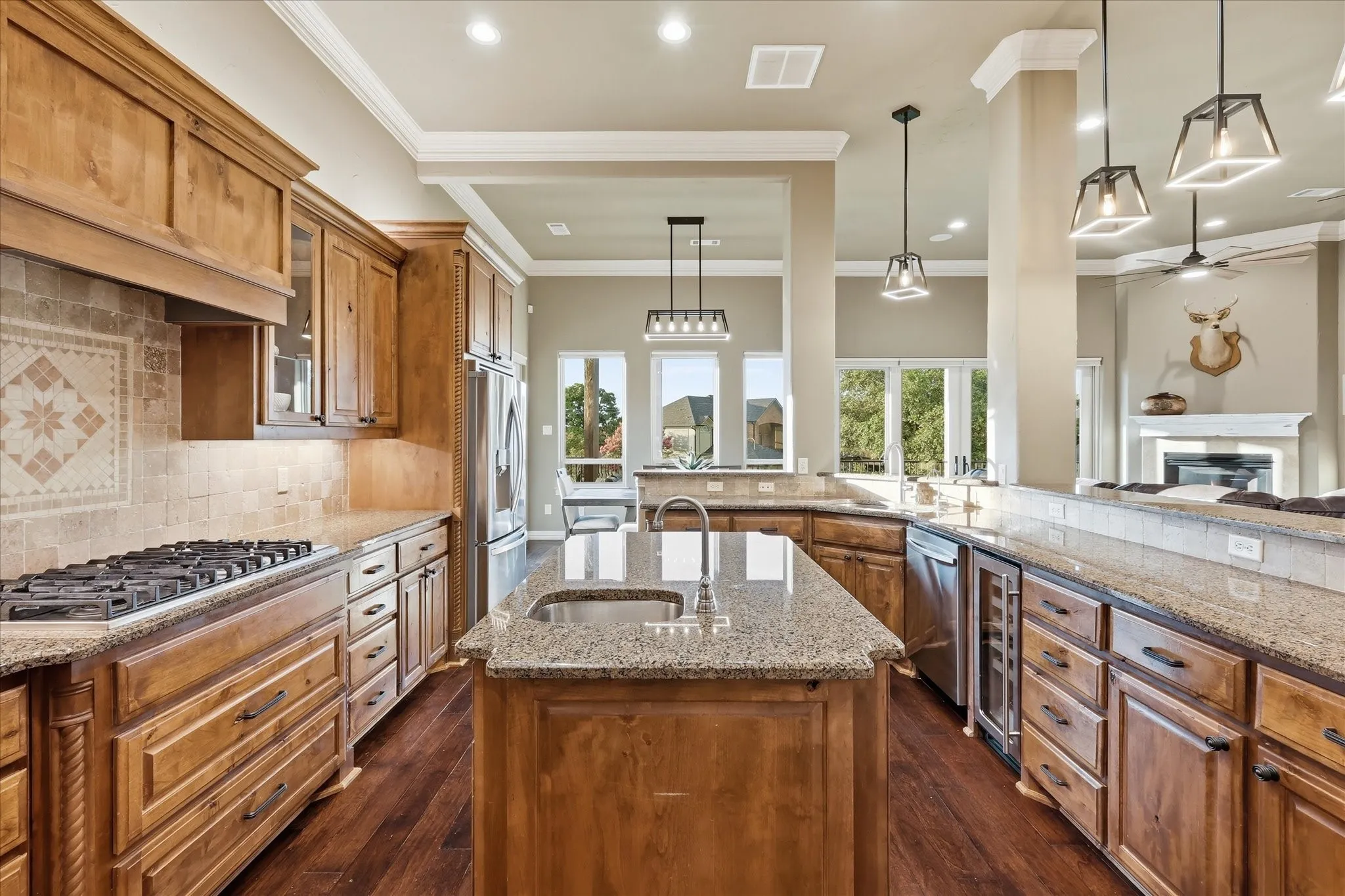 Wow! What an amazing chef's kitchen! You will love the Professional Viking SS convection oven, microwave, separate warming drawer, 6 burner gas cooktop and built in Uline wine refrigerator. There is an installed reverse osmosis water purifier under the sink that conveys with the home.