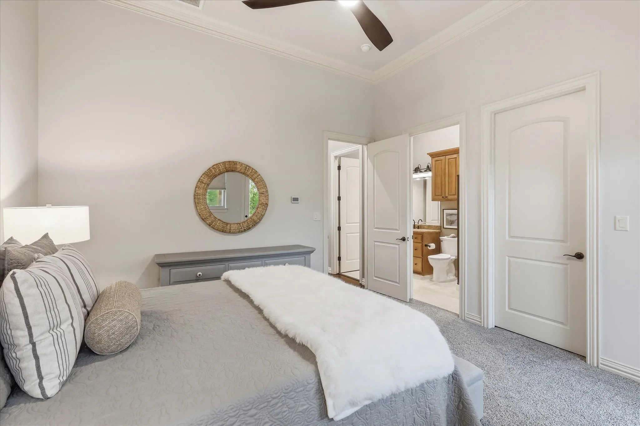 There is a huge walk in closet that leads to extensive floored attic storage space.