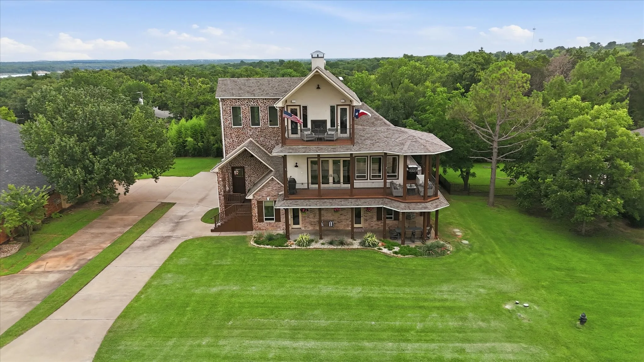 Welcome to this Texas Hill Country inspired lake property in the exclusive, gated community of Preston Forrest. This custom home is an entertainer's dream that features 6 covered balconies, decks and porches and amazing upgrades!