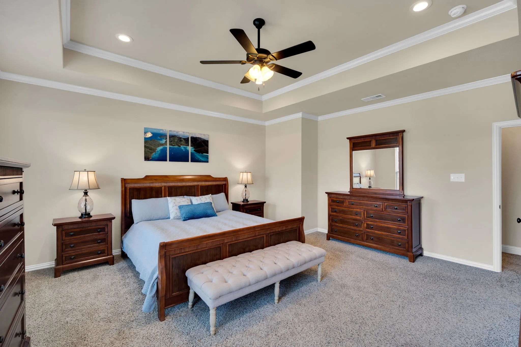 A primary bedroom fit for the leaders of the home. It was laid out to make your private dwelling space feel spacious and ready for any type of furniture design that you plan on placing here.
