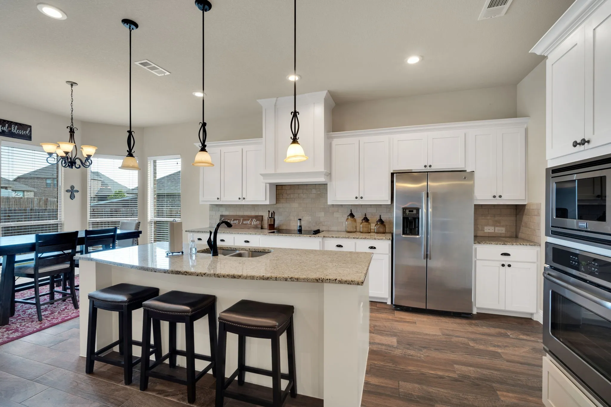 Who doesn't love a light, bright and easy to navigate kitchen?? This is a kitchen that promotes togetherness and new recipes!!