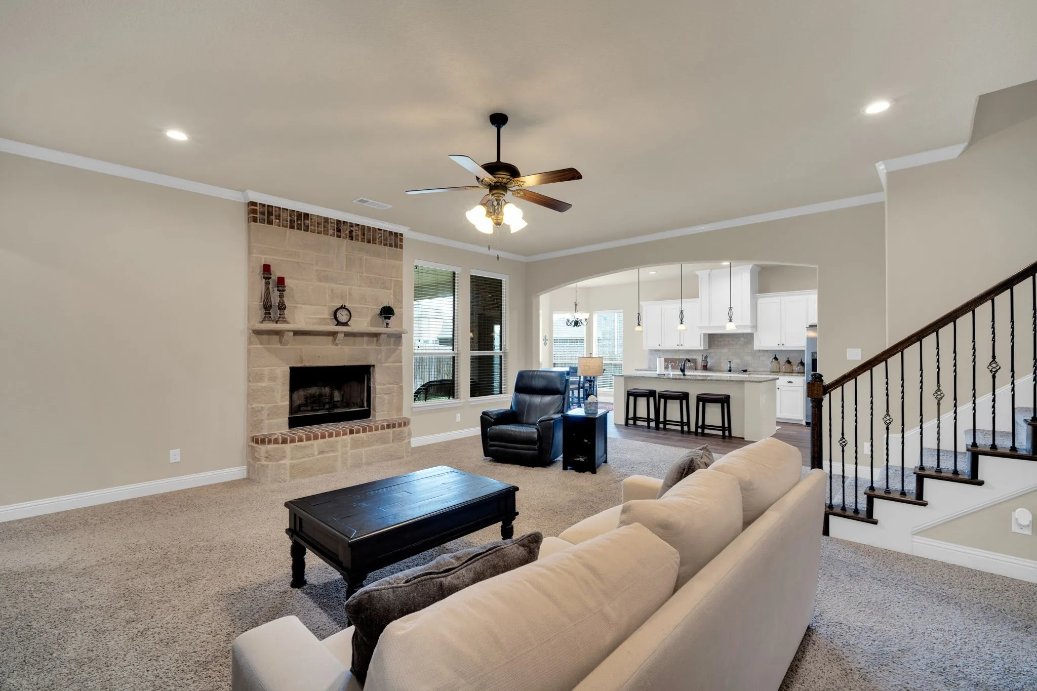 Spacious living room that encourages large gatherings for meals and entertaining.
