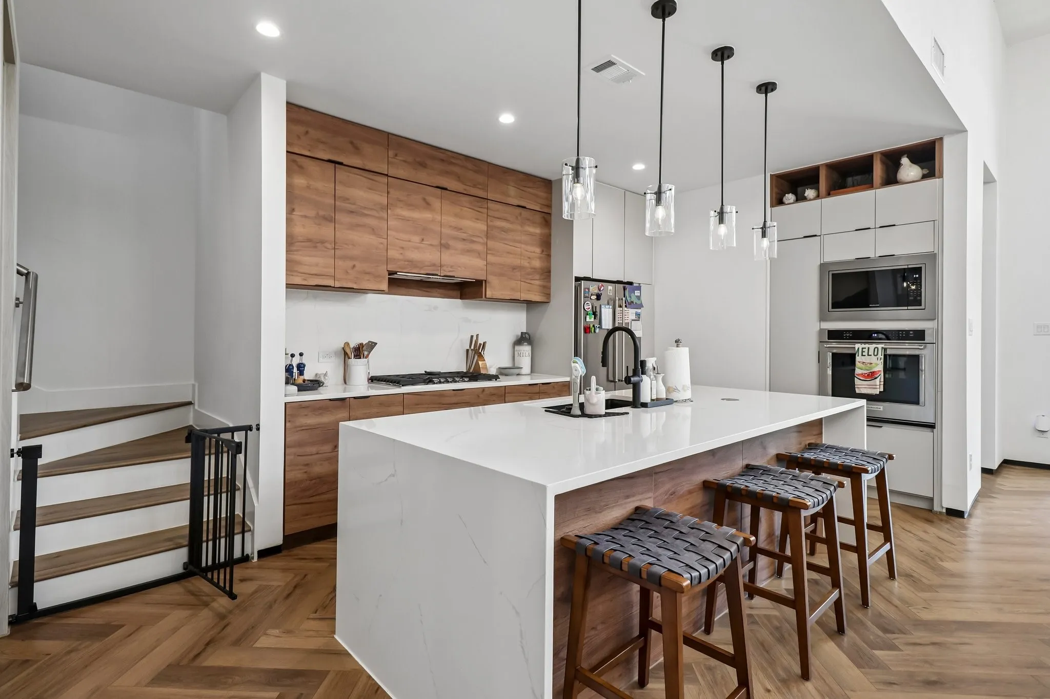 Kitchen has Walk In Pantry and Gas Cooktop