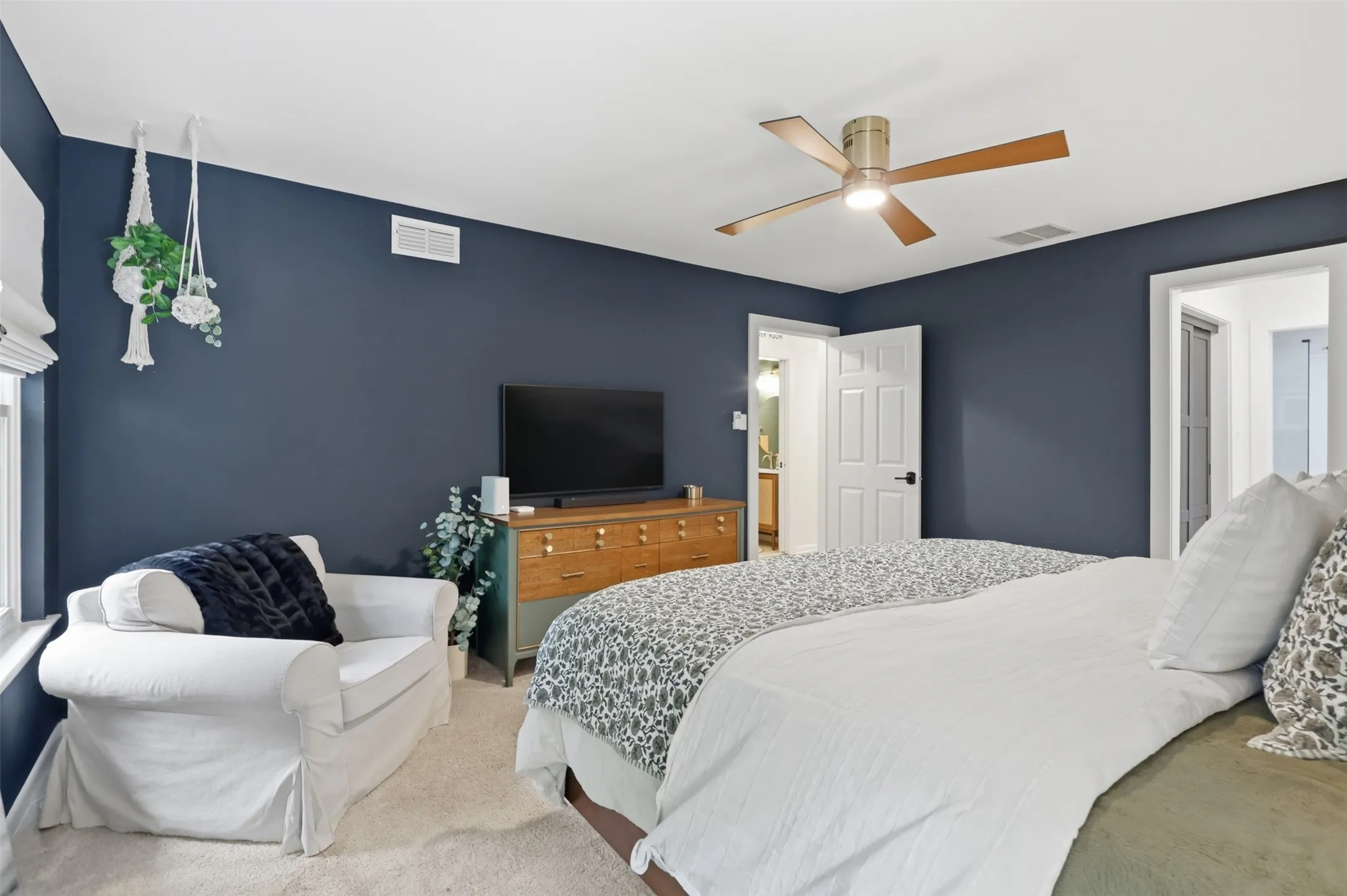 Primary Bedroom has room for a sitting area .