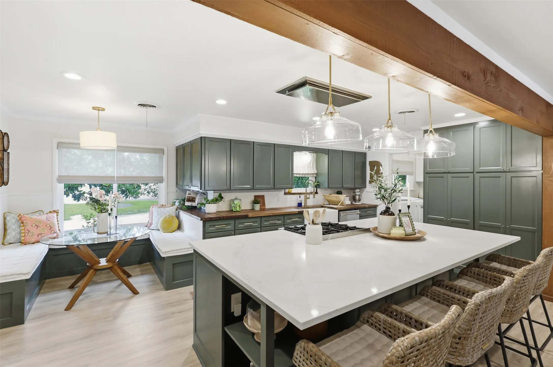 Custom Built Banquette with custom cushions makes a cozy space for early morning breakfasts.