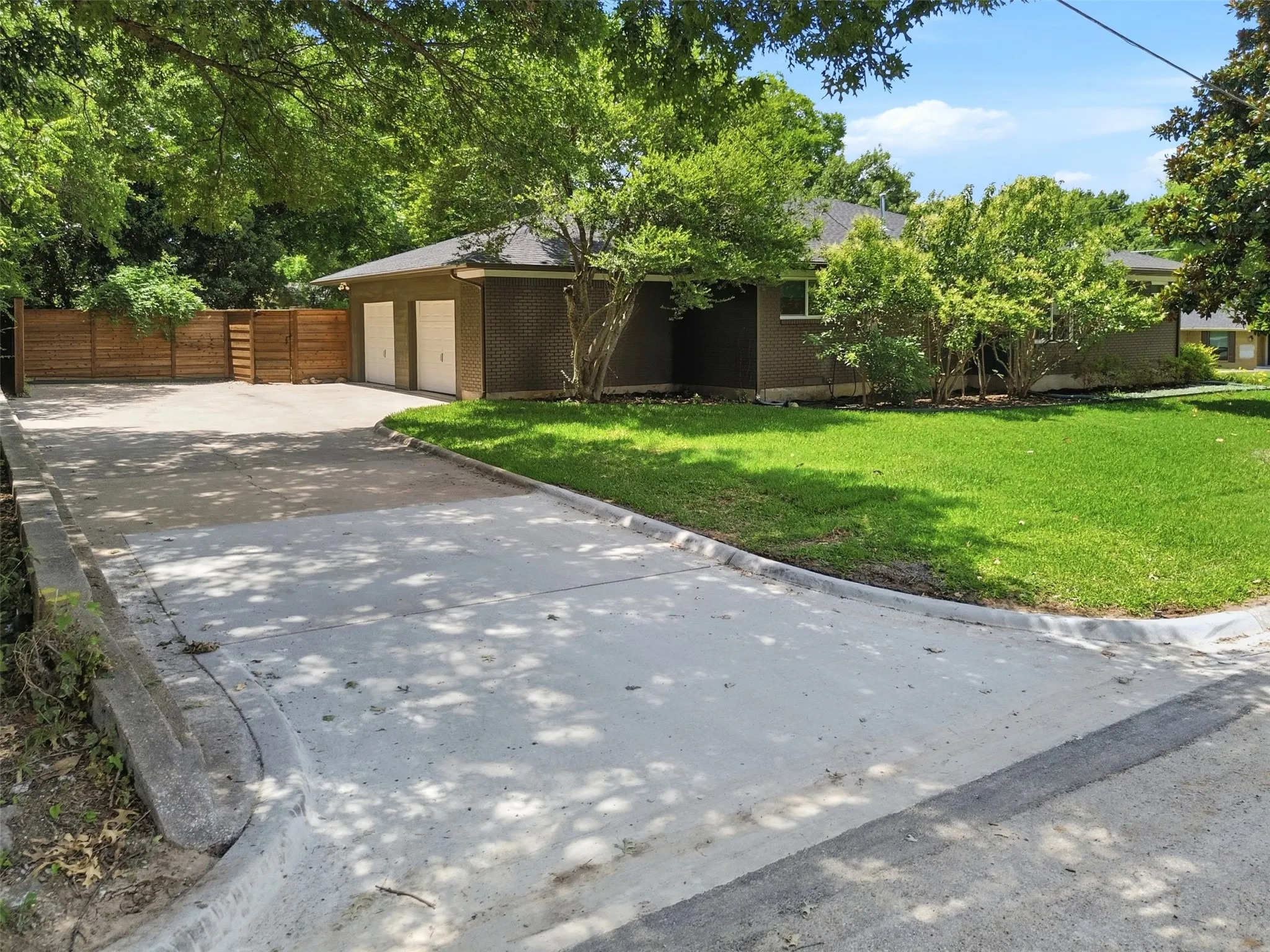 Large Private Driveway leads to garage with plenty of room for parking.