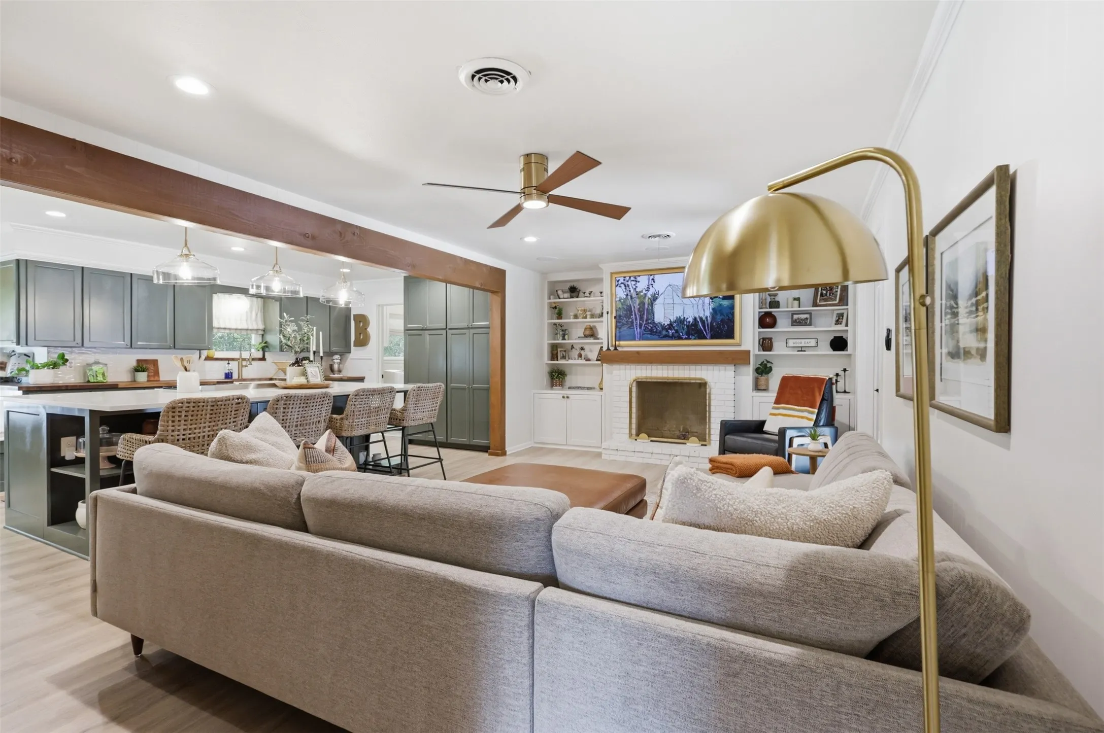 Family Room features Fireplace with built-in cabinets, recessed lighting and wired for surround sound.
