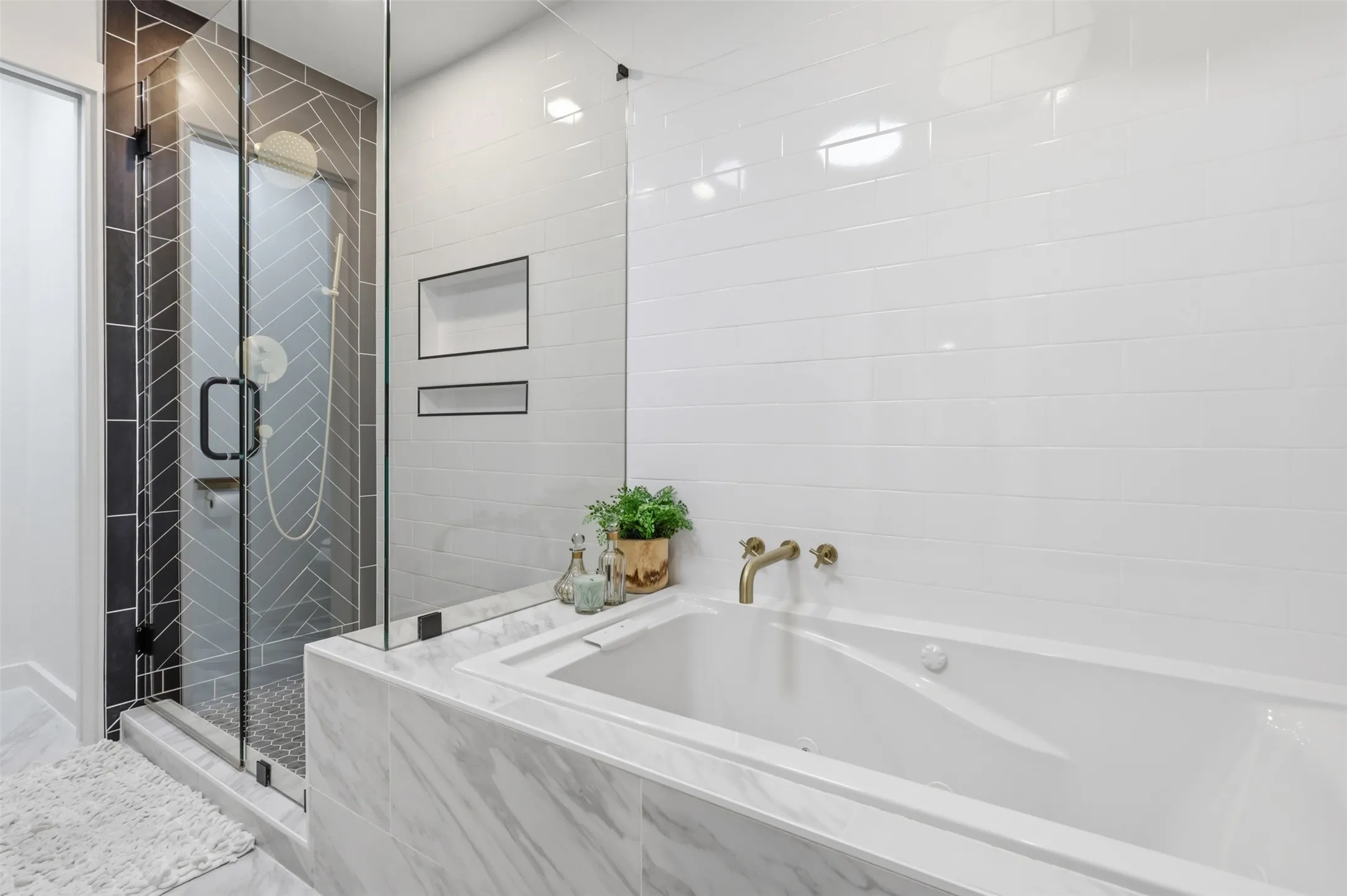Separate shower and large jetted tub create a spa like atmosphere for relaxing at the end of a long day.