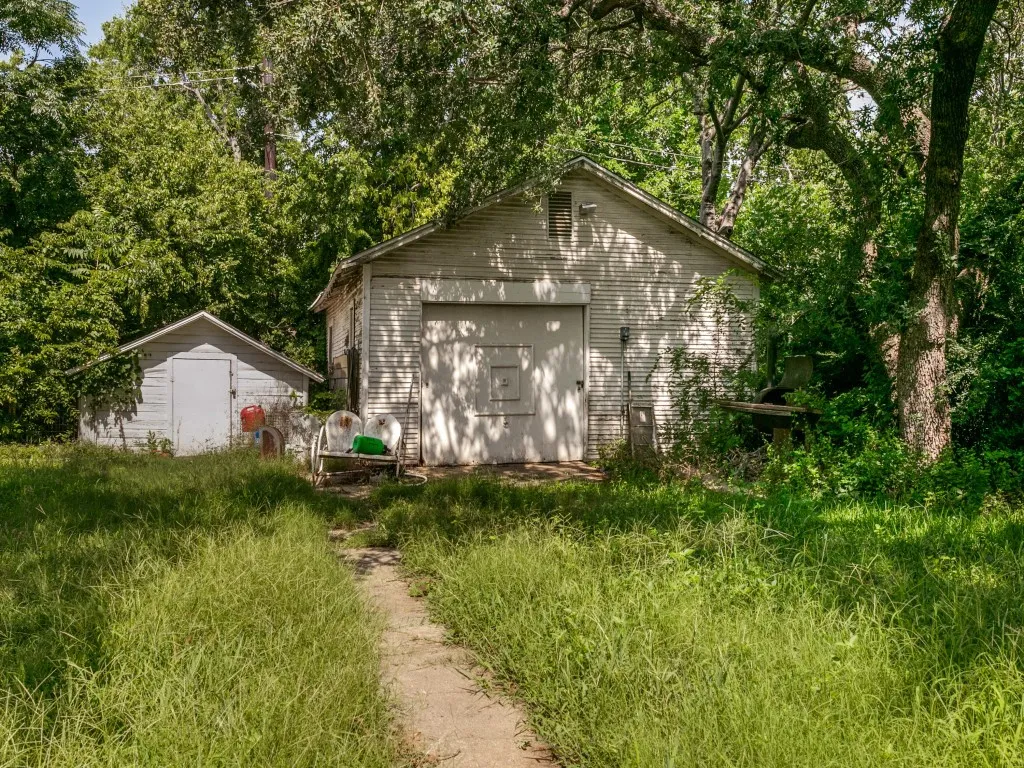 The detached garage and storage shed give you additional usable space for tools, mowing equipment, and projects.