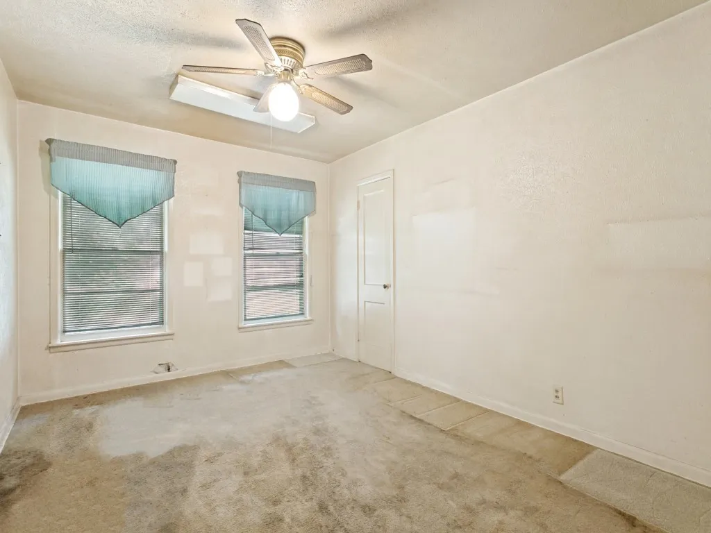 This spacious bedroom has a large walk-in closet.